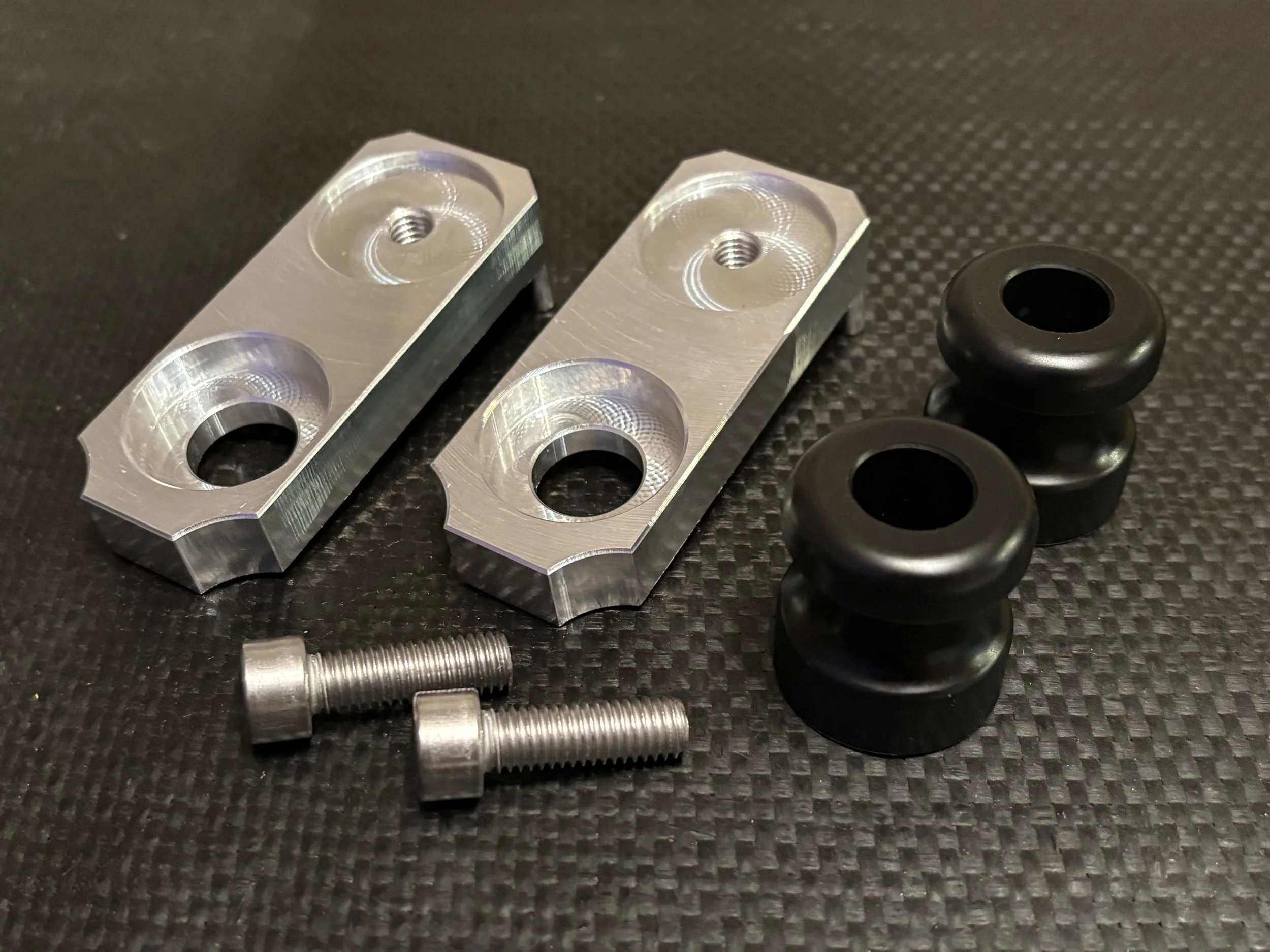 pitbike chain adjuster blocks with m8 paddock stand bobbin crash sliders rear threads 2.jpeg