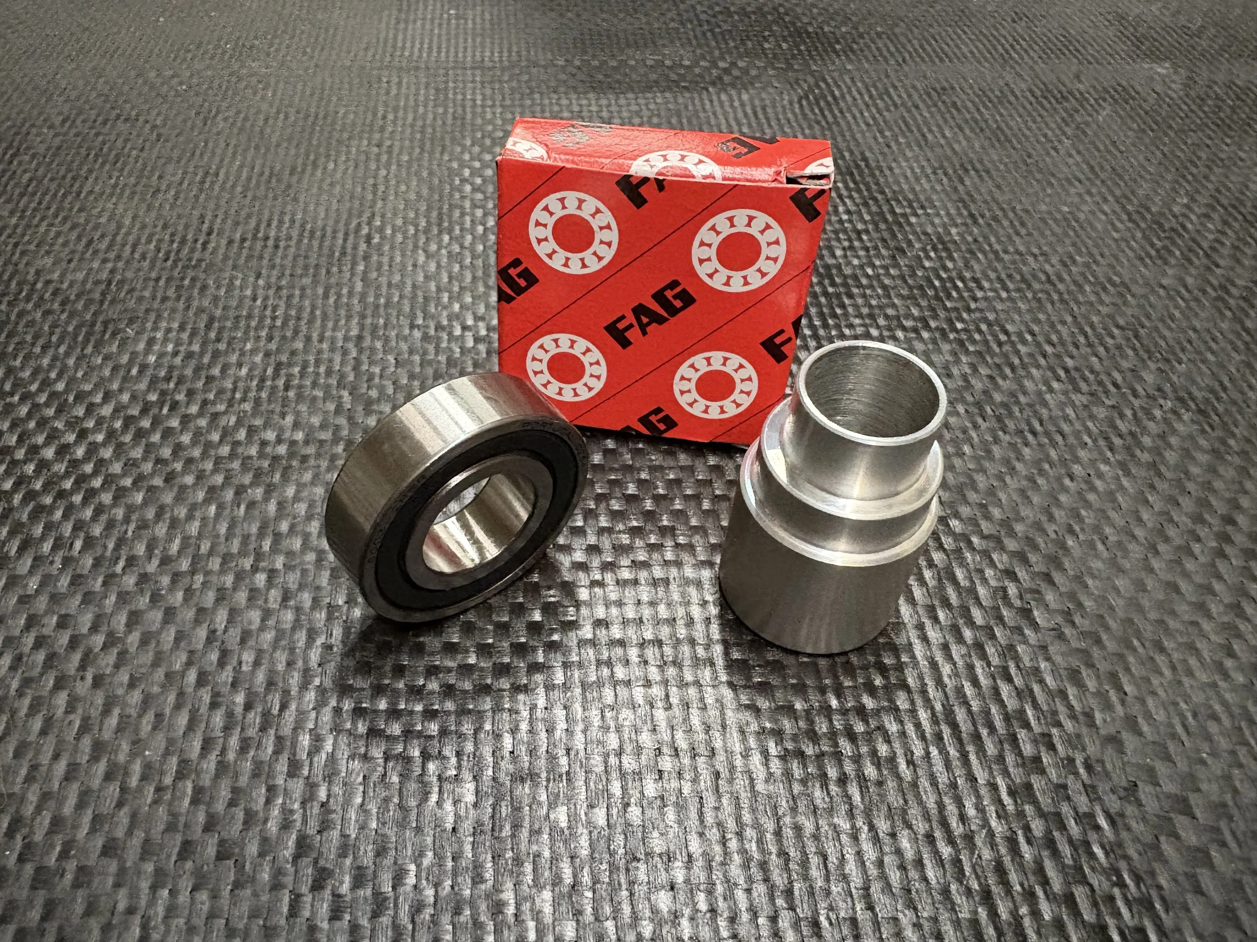 PlazCutz Racing pitbike captive wheel spacer with bearing