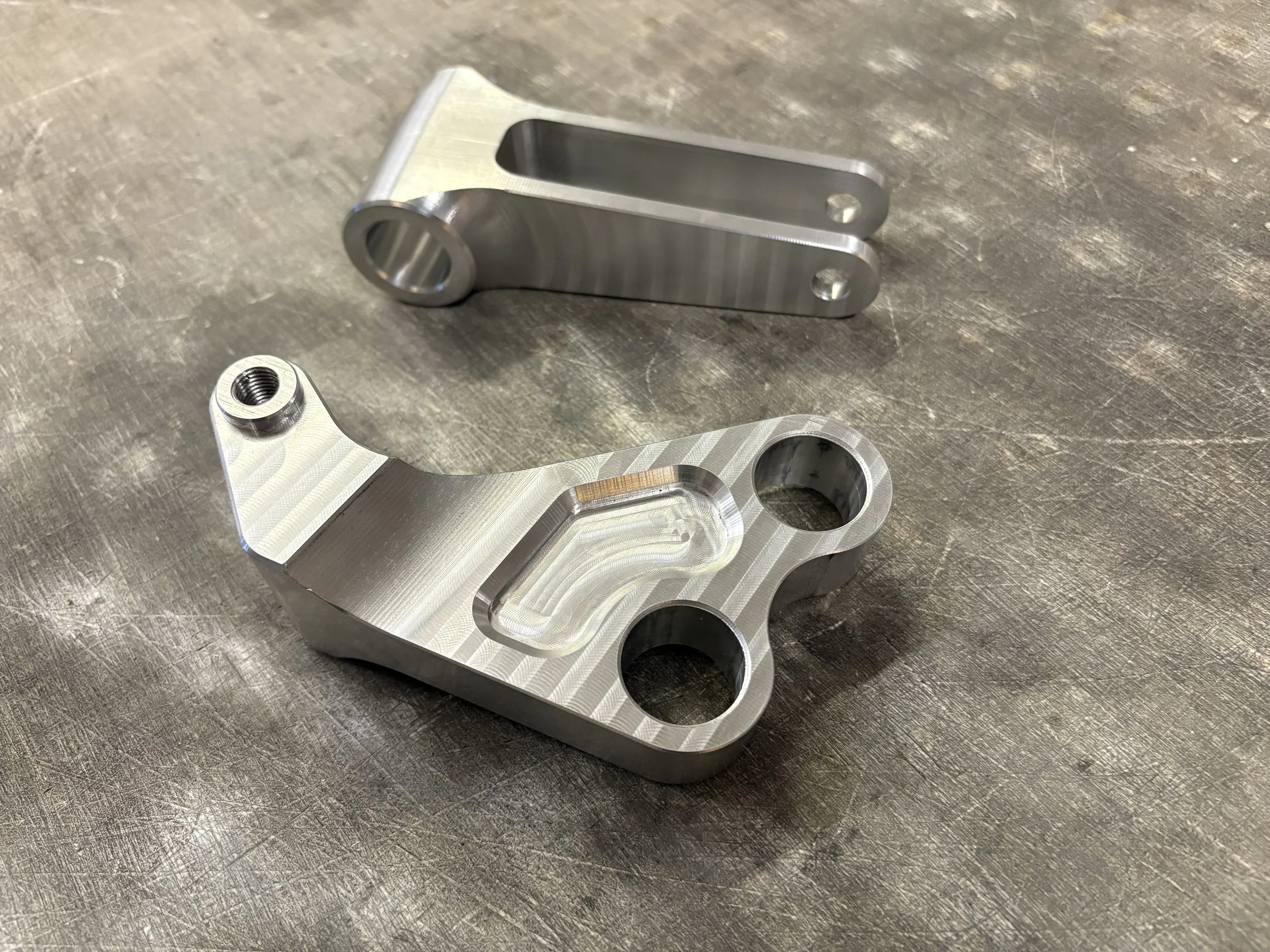 Rear shock suspension knuckle and linkage cnc machined