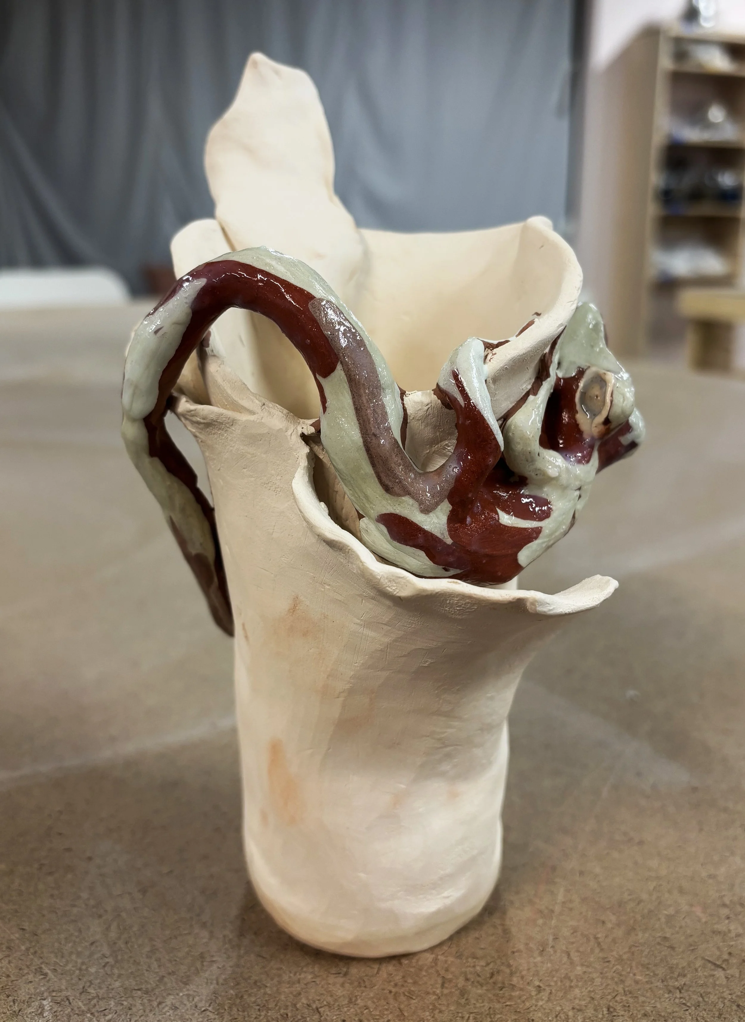 "Symbiosis" - a look into the glazing process. Believe it or not, this lizard will (hopefully) be black with specks of highlight colors. 