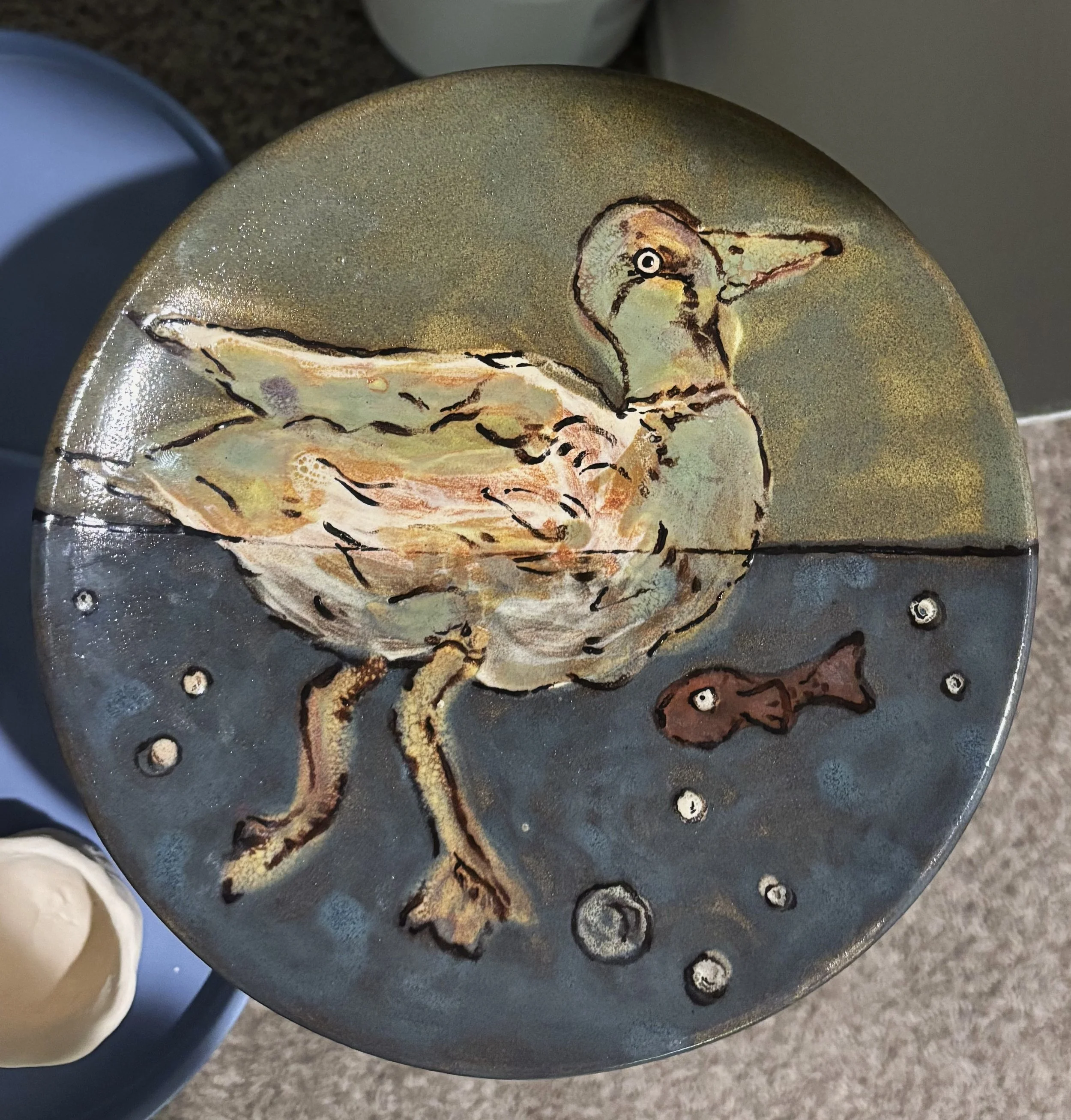 "On the Hunt", 1 of 3. The first duck plate, fired. The colors shocked me, and I am so excited to see the other two!