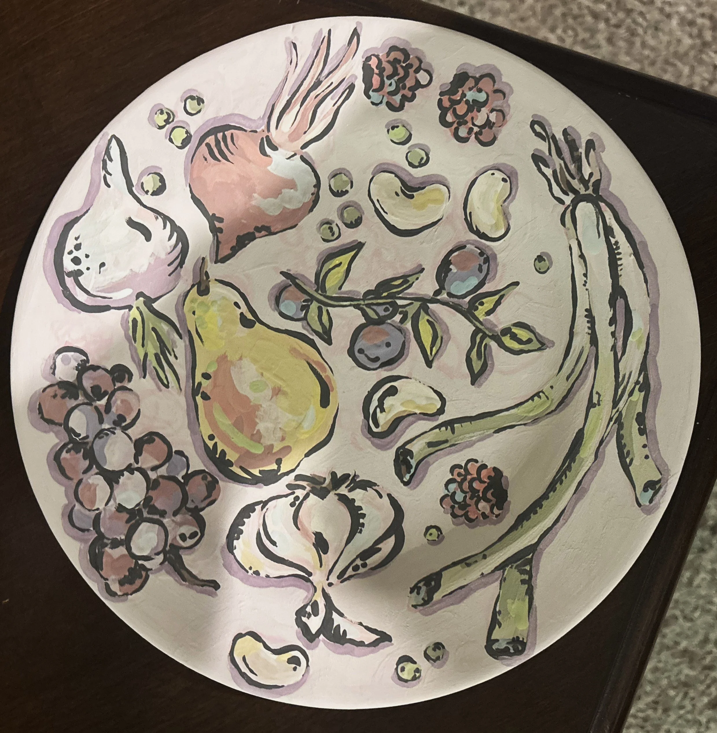 "Produce Plates", 2 of 2. This set of plates features produce from a specific area and follows the same painting technique as the "Ocean Gifts" platter. 