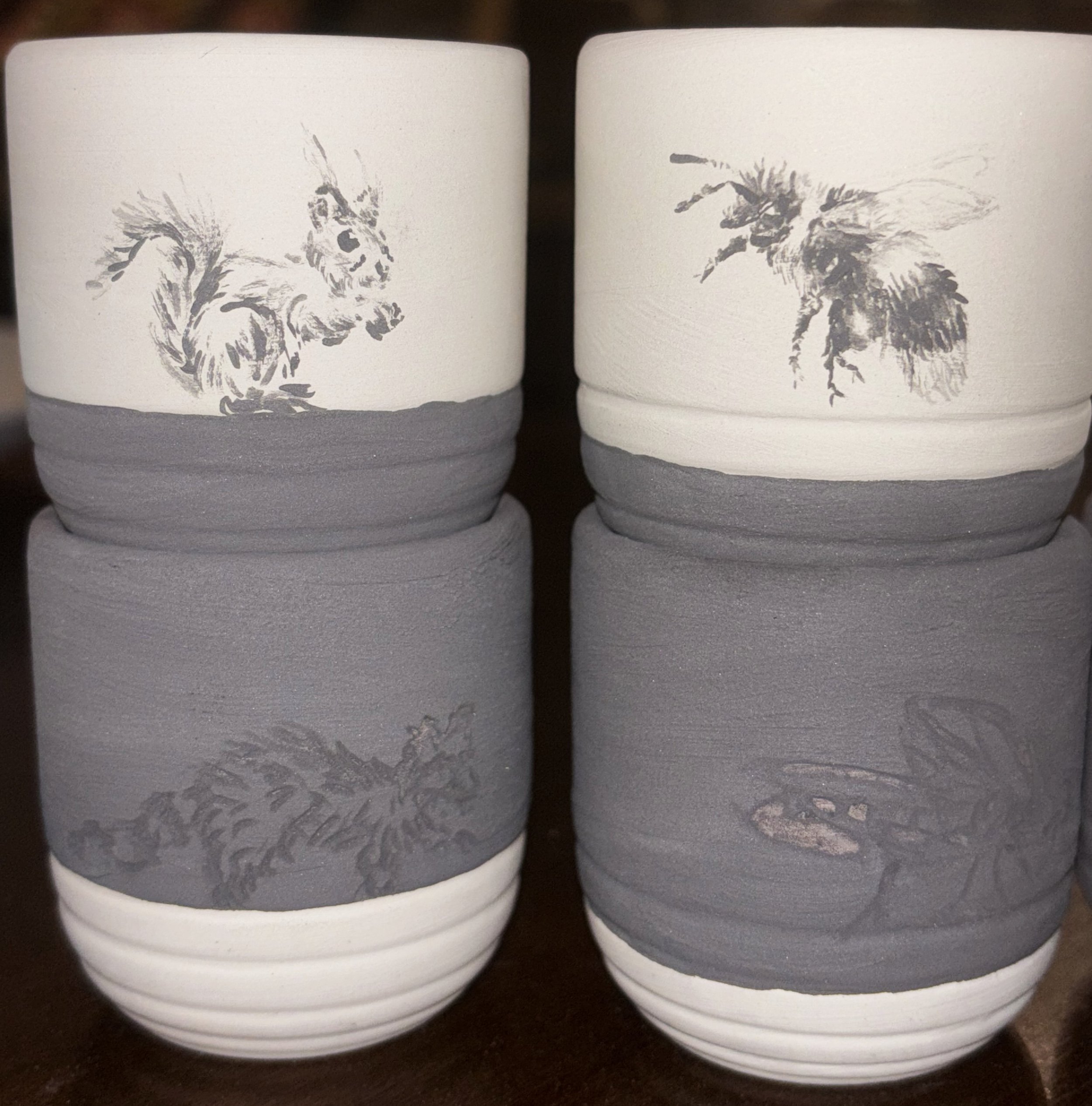 "Day and Night", 2 of 2 (before firing). This set of 8 small glasses each feature a diurnal and nocturnal animal, respectively. This truly tested my precision and my eyes!