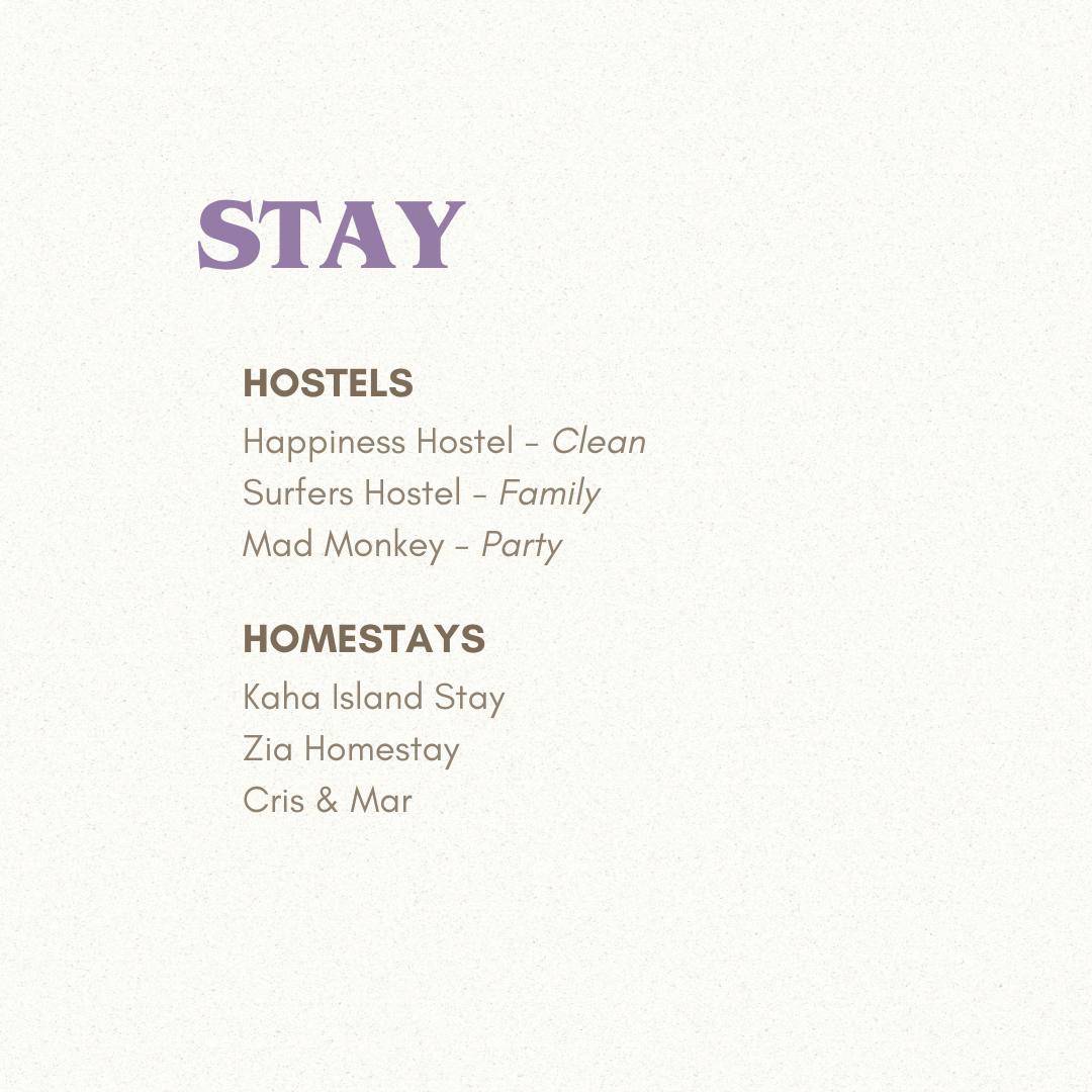 A promotional sign listing hostel and homestay options, with hostel names Happiness Hostel, Surfers Hostel, Mad Monkey, and homestay names Kaha Island Stay, Zia Homestay, Cris & Mar.