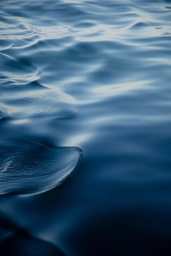 Close-up of calm ocean water with gentle ripples and reflections