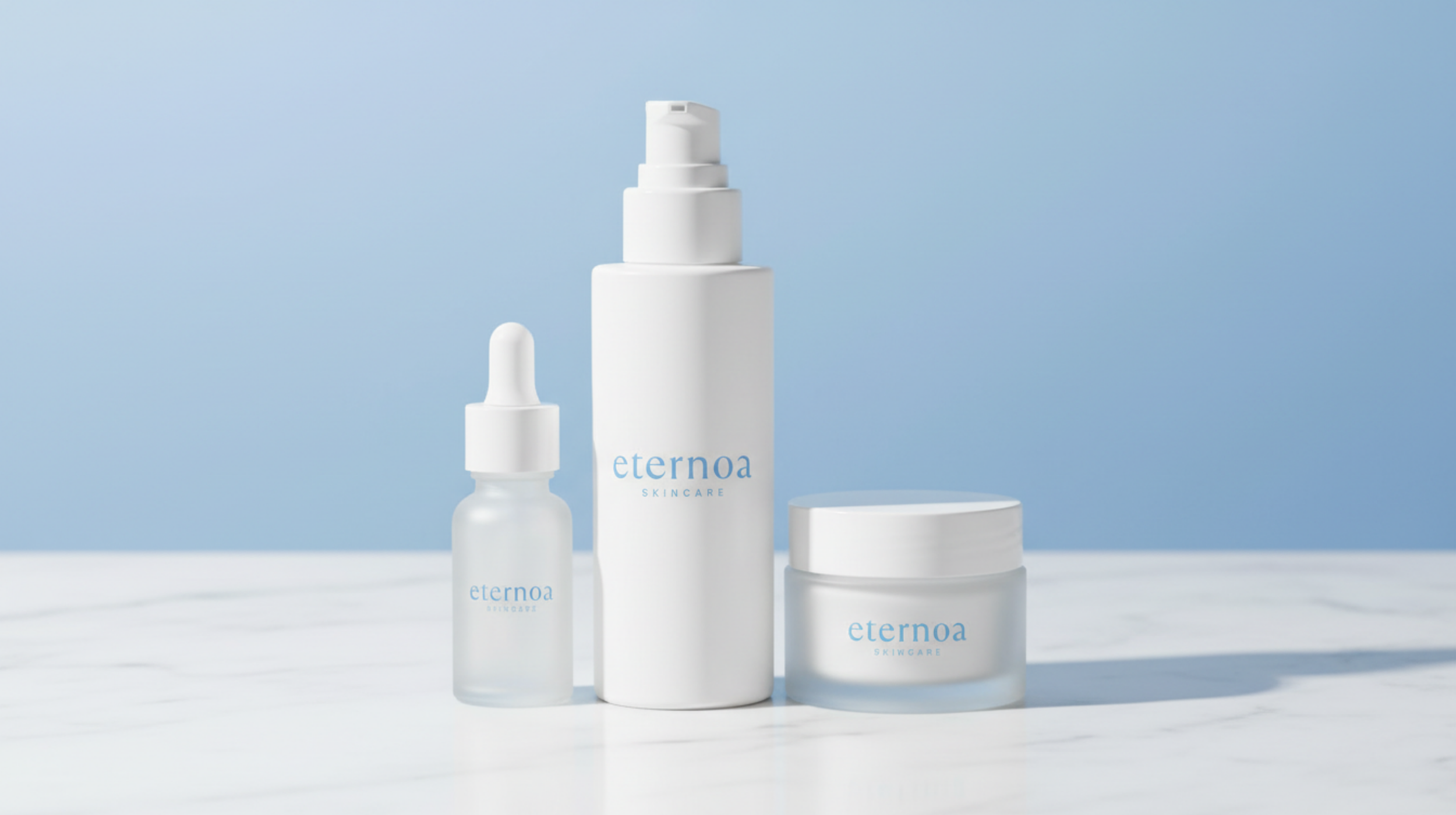 Set of three white skincare bottles on white surface against blue background, labeled 'Eternoa SKINCARE'.