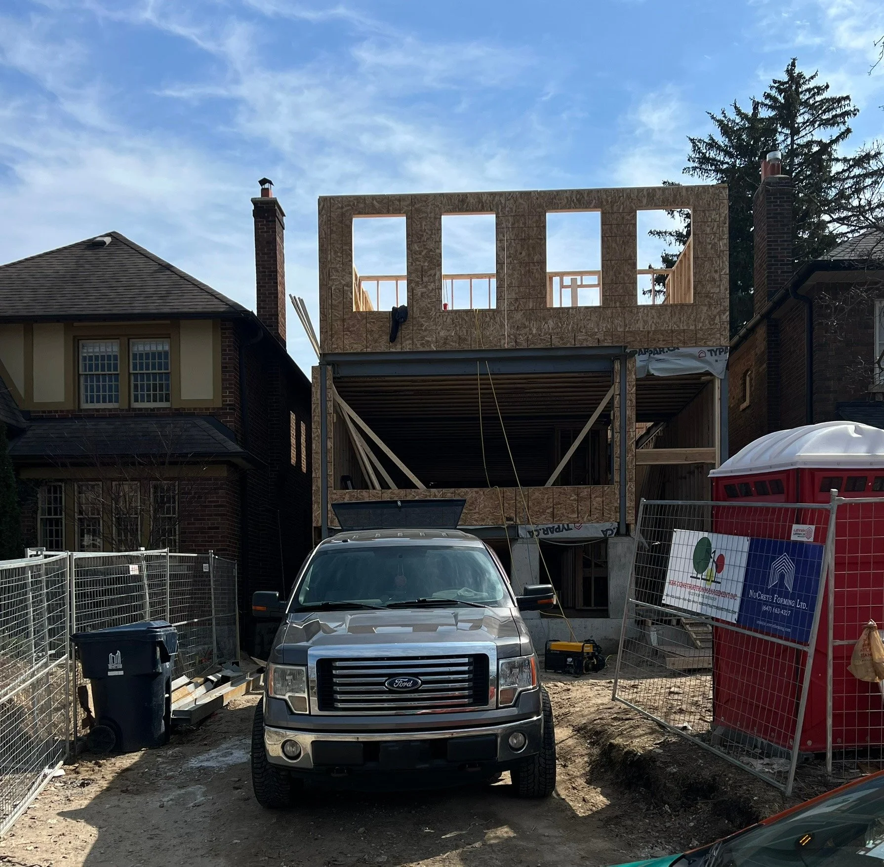 Street view of 3-storey Multiplex under construction.