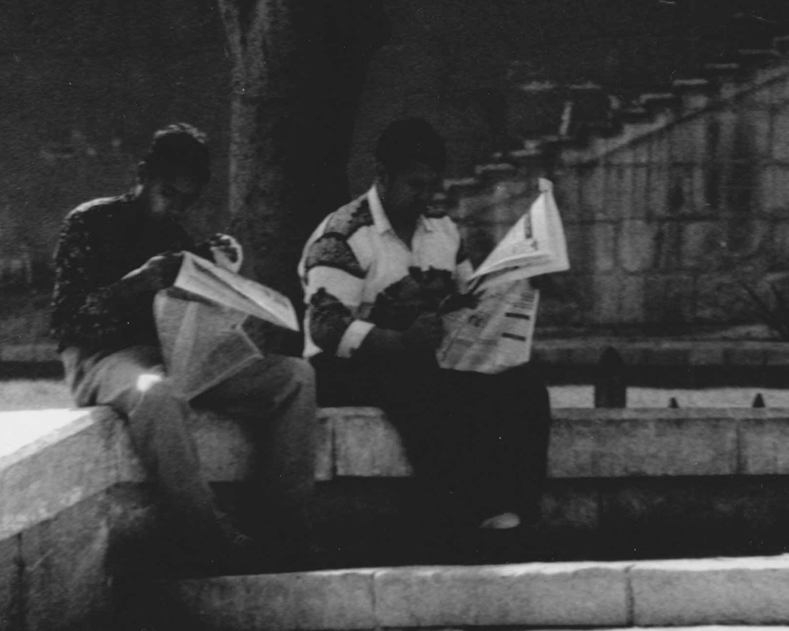 Reading Newspapers. Sultan Hassan Rifa'i Passage