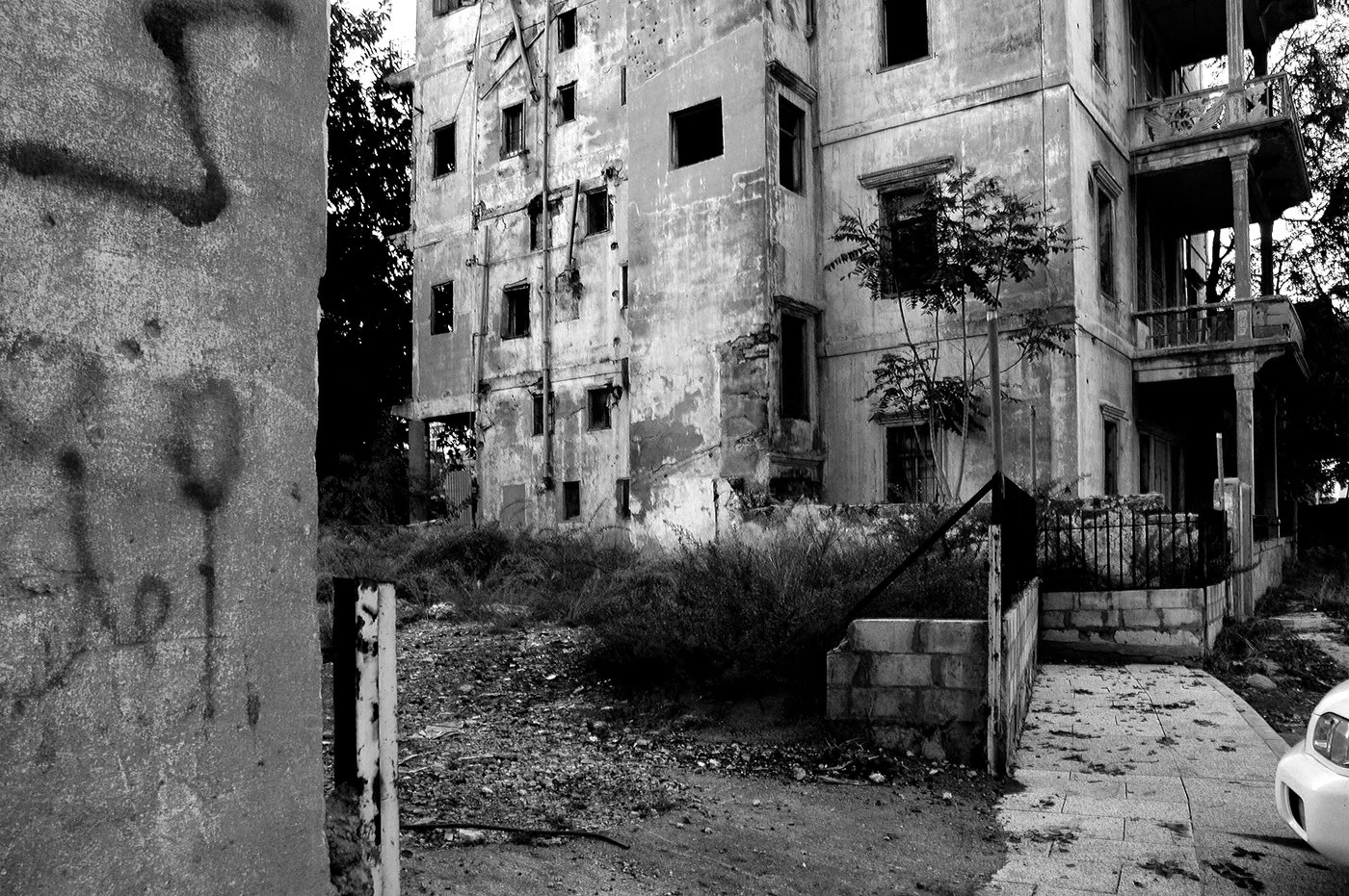 Beirut’s fading urban beauty. An abandoned courtyard. 2005