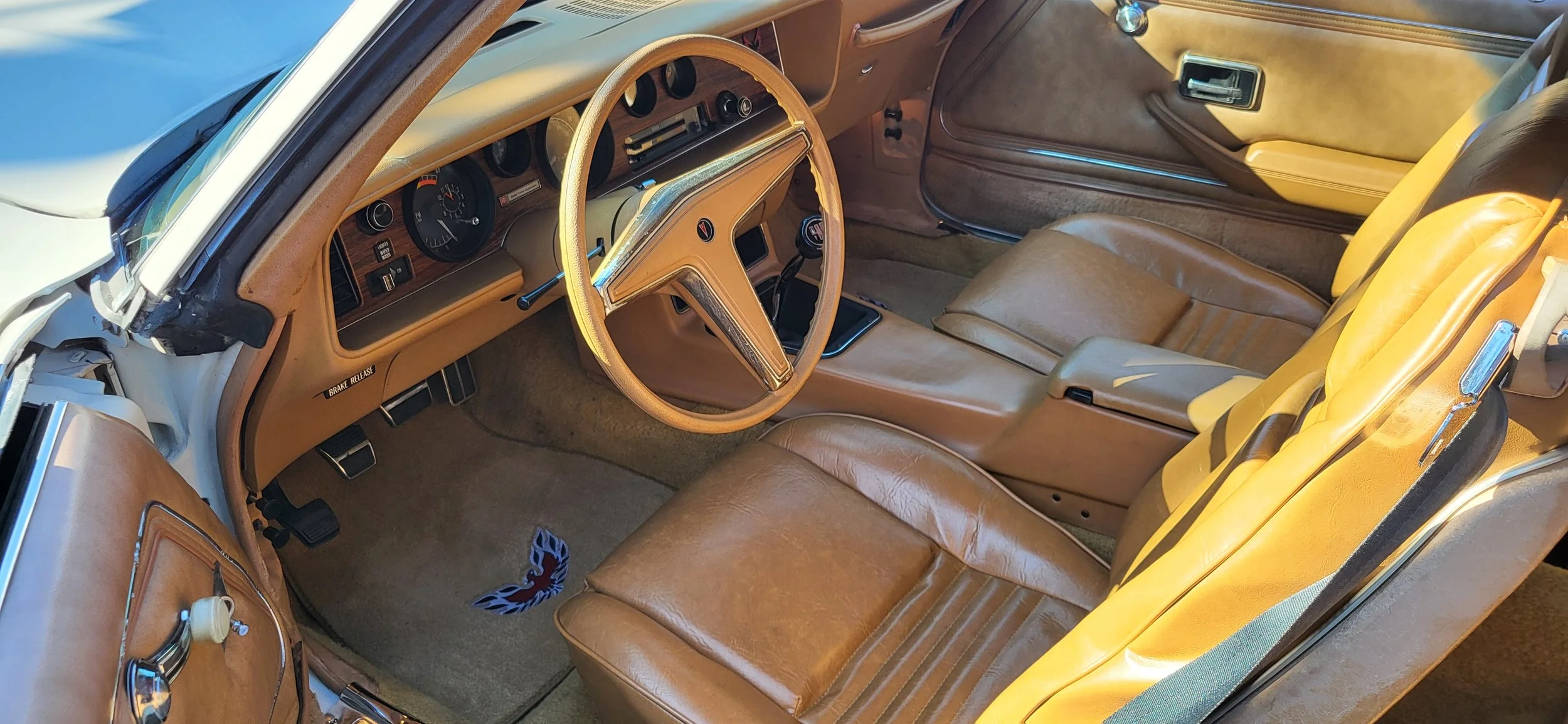 Oranssi technician working on a roof project