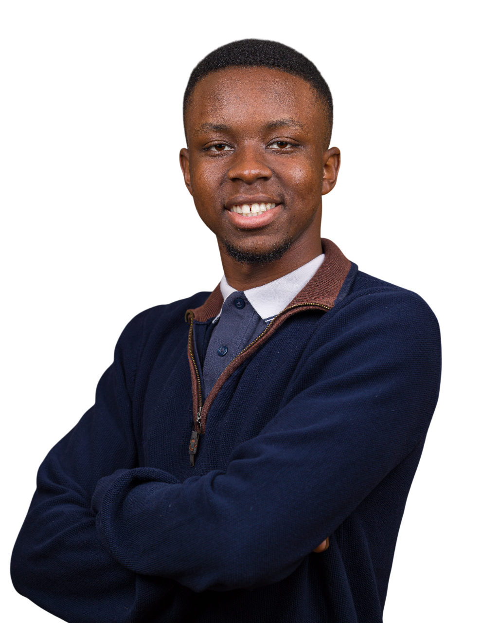 Wilson Katsande - A young  man smiling with arms crossed, wearing a navy blue jacket with brown collar over a gray polo shirt.