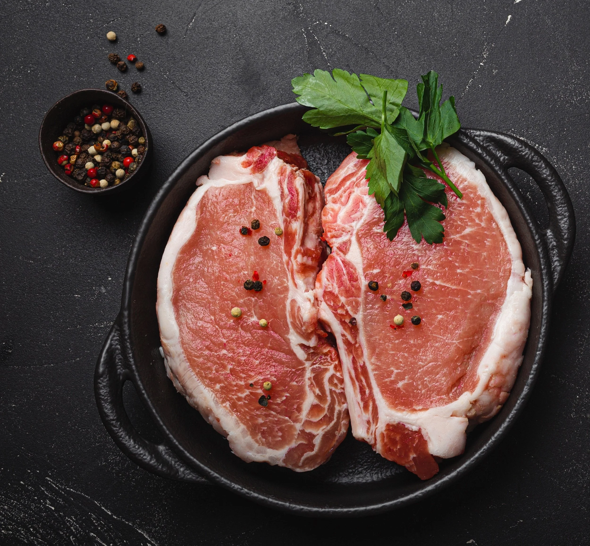 pork loin chops raw.jpg