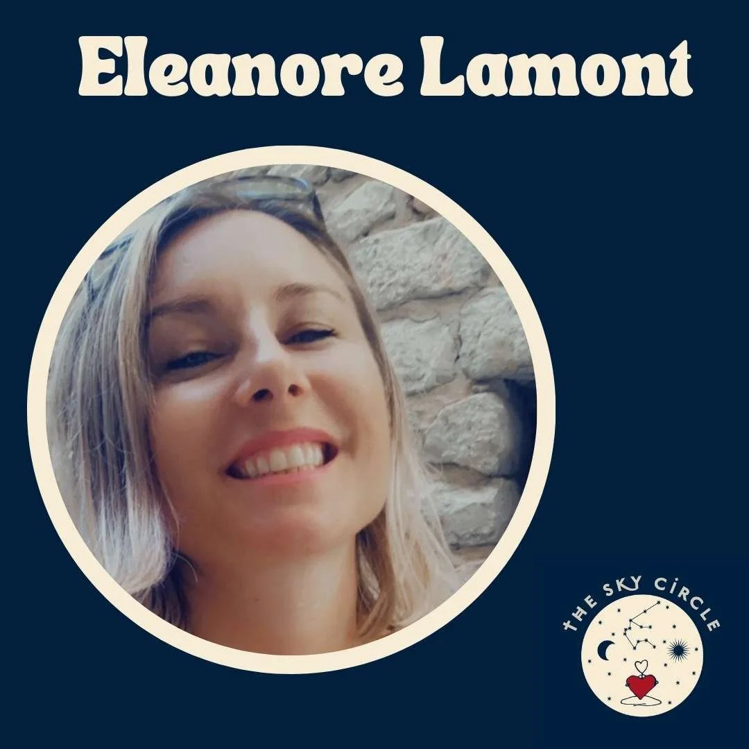 Close-up of a smiling woman with blond hair, blue eyes, and sunglasses on her head. The background features a stone wall. The image is part of a graphic design with the text 'Eleanore Lamont' and a logo for 'The Sky Circle' in the bottom right corner.