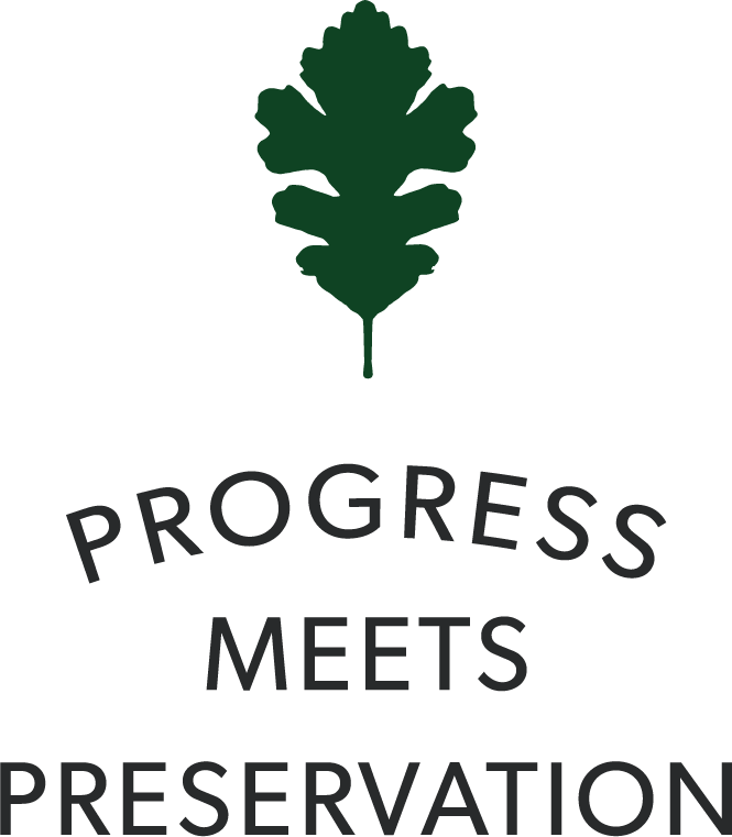 Holder Land Management logo. A green tree icon with the words "Progress Meets Preservation" written below in black text.