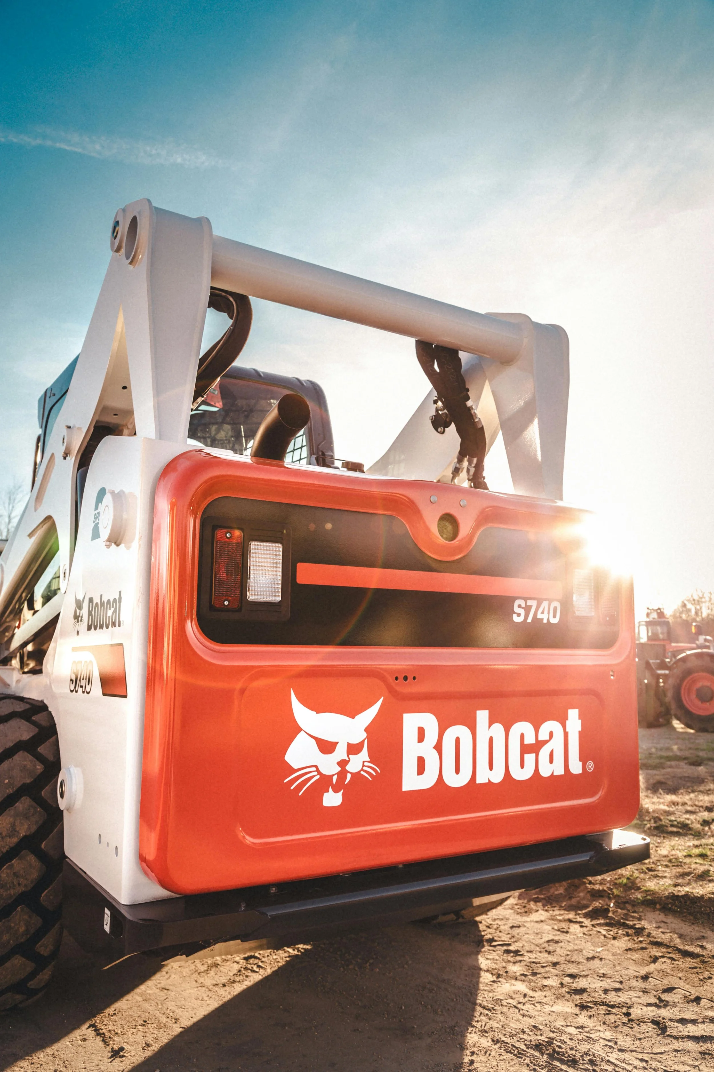 Bobcat skid steer loader at a job site.