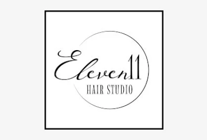 Logo for Eleven 11 Hair Studio featuring elegant script text inside a circle.