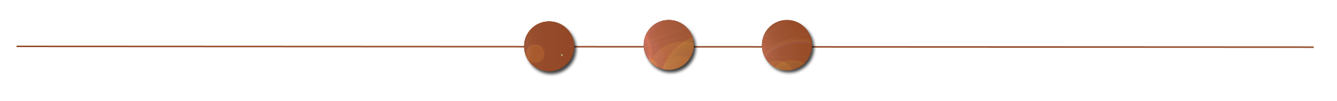 Close-up photo of a guitar fretboard with three fret markers.