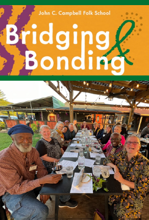Title Bridging and Bonding at John C Campbell Folk School. Photo of Black and white people at a dining table.