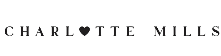 Text logo that says 'Charlotte Mills' with a heart symbol between the words.
