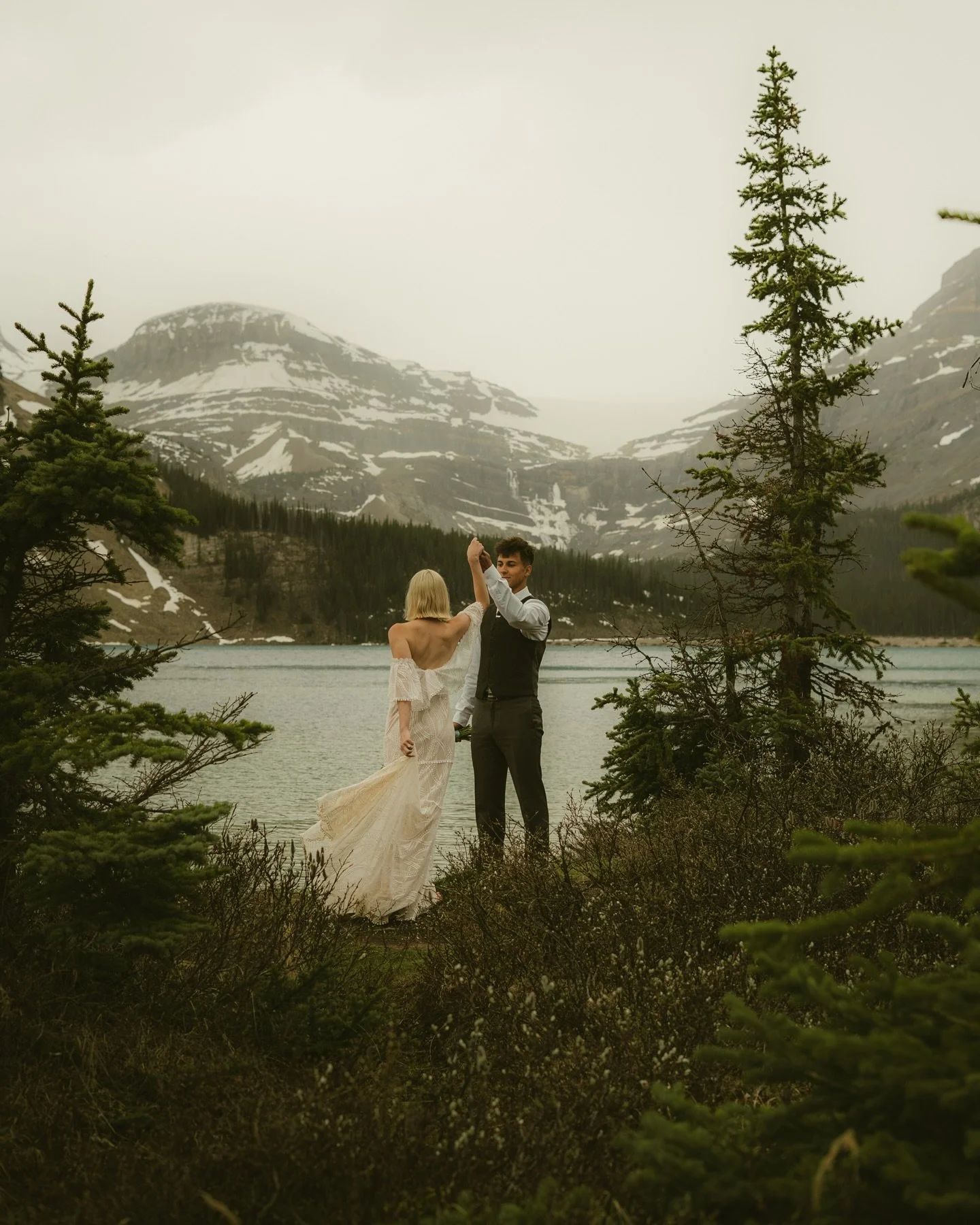 Moody skies and mountain vows this one surprised us in all the best ways.

The day we had planned with A + C definitely didn&rsquo;t turn out how we expected.
It was our first day in Banff the last weekend in May. It was hot, sunny, and bright blue s