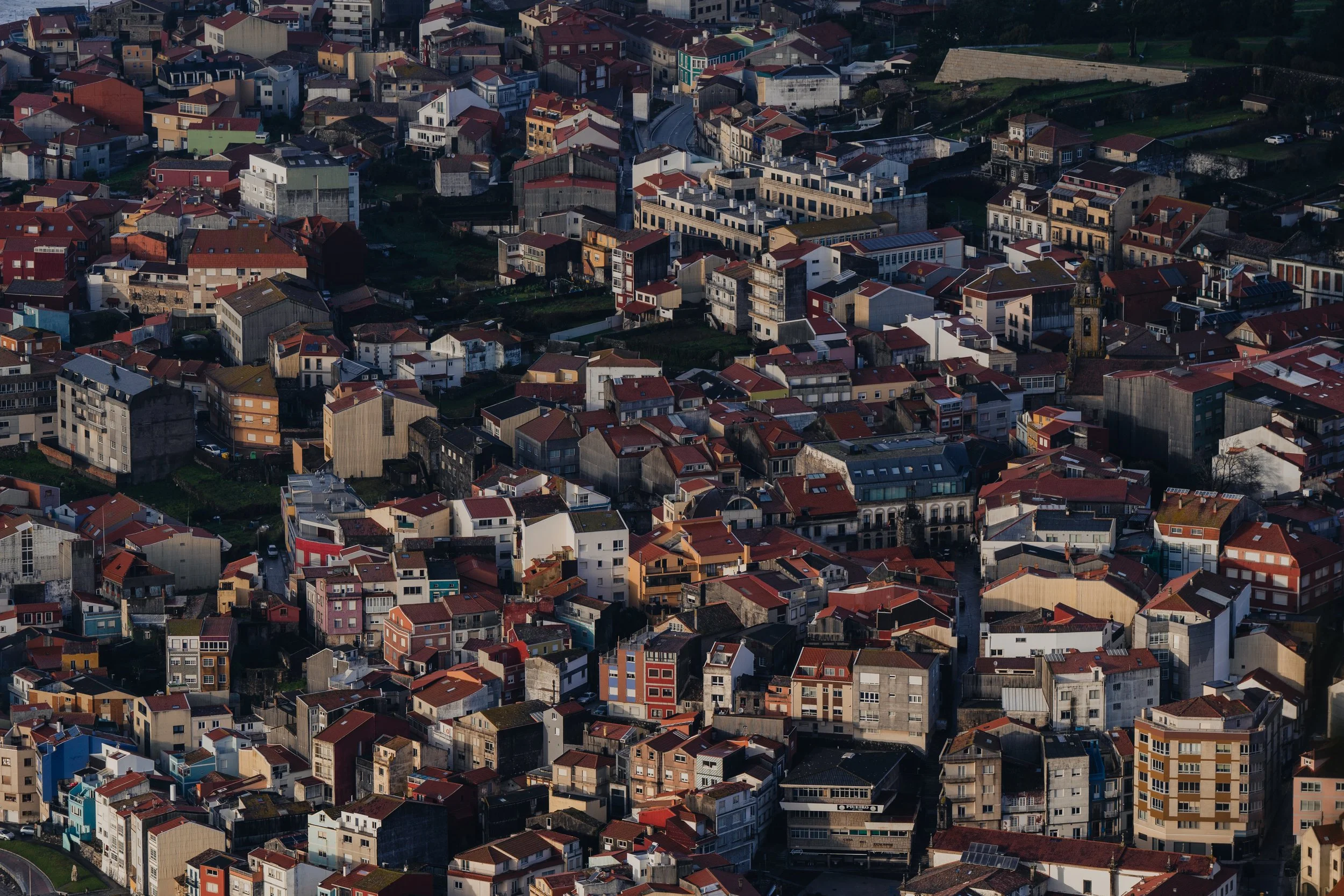 The fishing town of A Guarda, historically and traditionally a fishing community, lit by shifting light during a storm, in southwestern Galicia, northwestern Spain, May 2025.