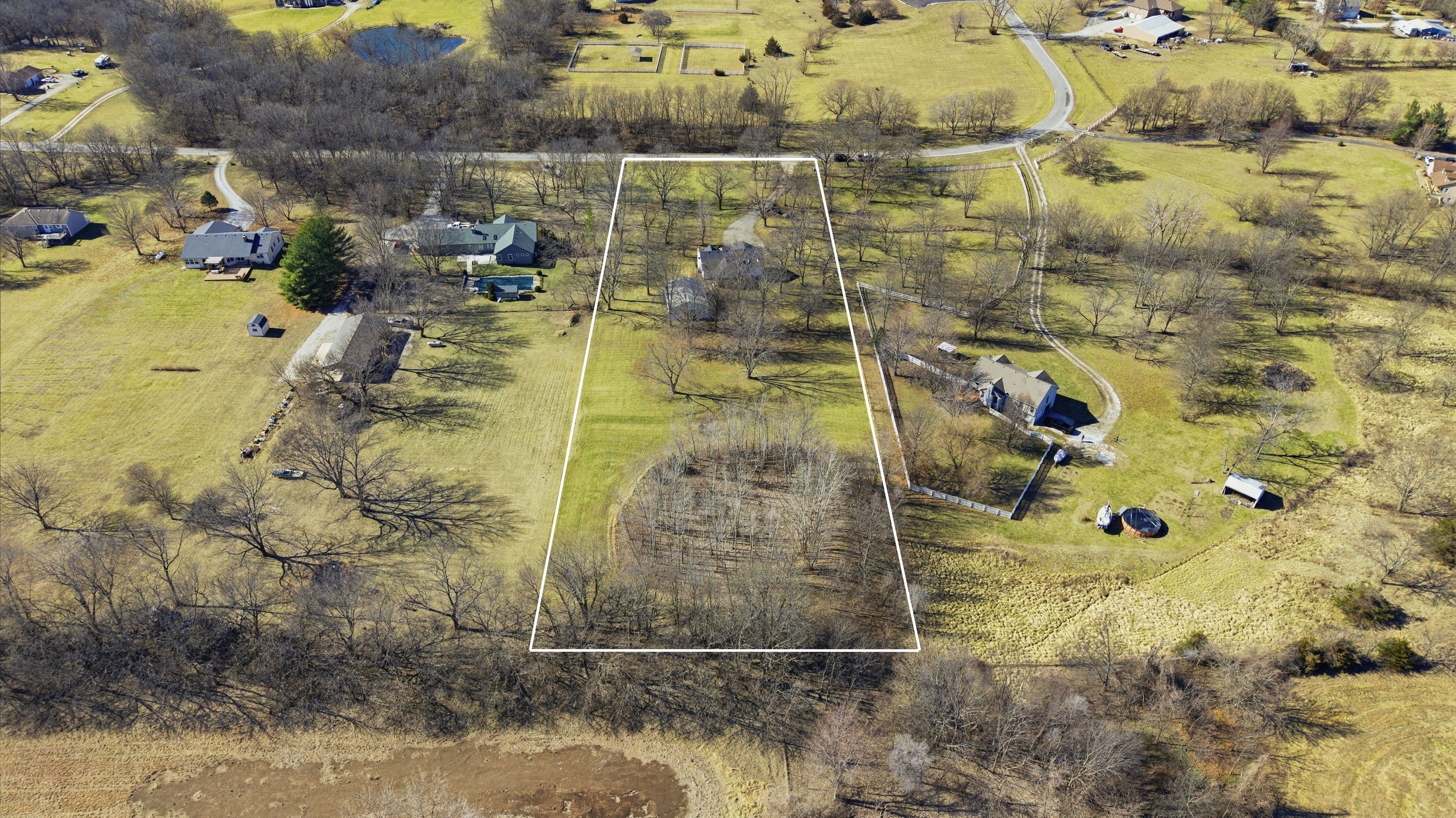 Peculiar Missouri house aerial photos with boundary.jpg