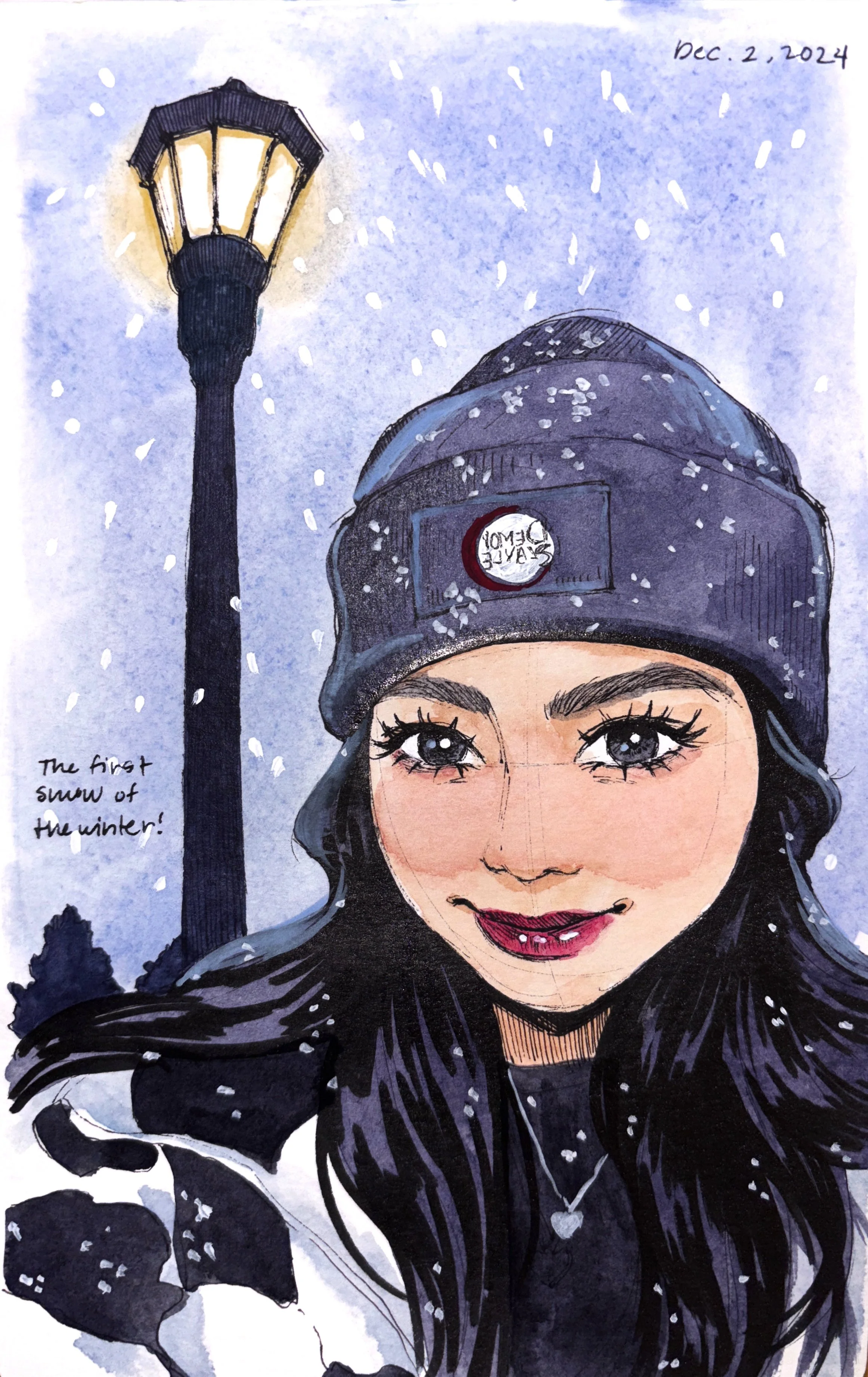 A watercolor illustration of a smiling woman with long dark hair, wearing a navy blue beanie and a black jacket, standing outdoors in a snowy winter scene with a streetlamp in the background. Snowflakes are falling, and the scene is labeled "Dec. 2, 2024" with a handwritten note "The first snow of the winter!".