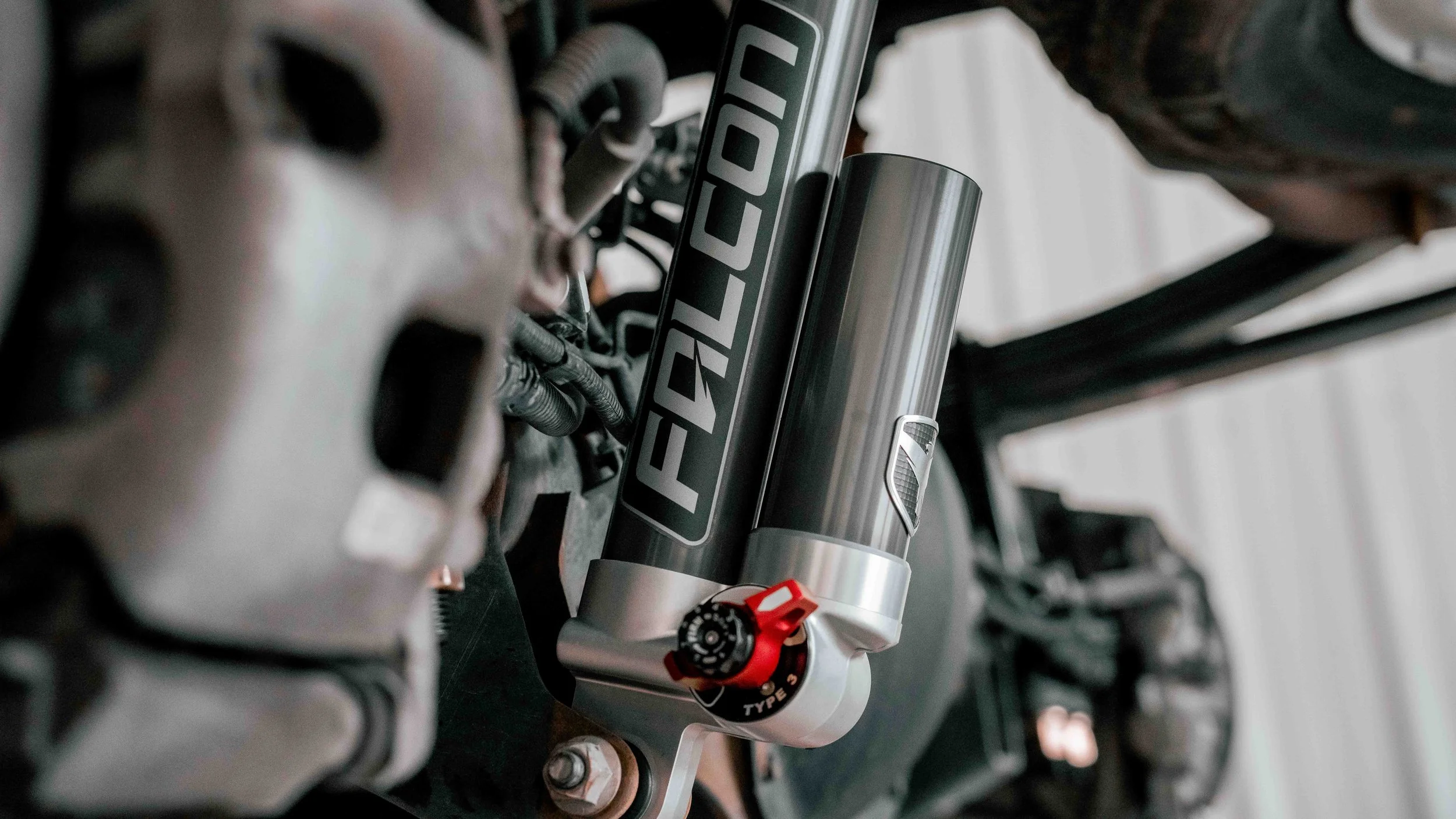 Falcon 3.3 shock installed on a GMC Sierra ReadyLIFT 6-inch MAX3 suspension lift at Xtreme Car & Truck in Bridgeville, PA.