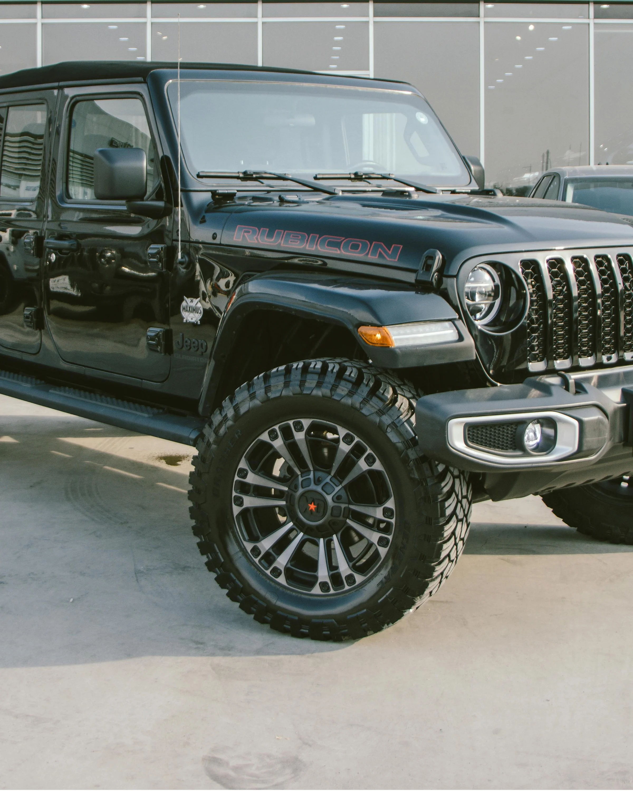 Jeep Wrangler Rubicon with aftermarket wheels and off-road tires, available through Xtreme Car & Truck Accessories in Bridgeville, PA