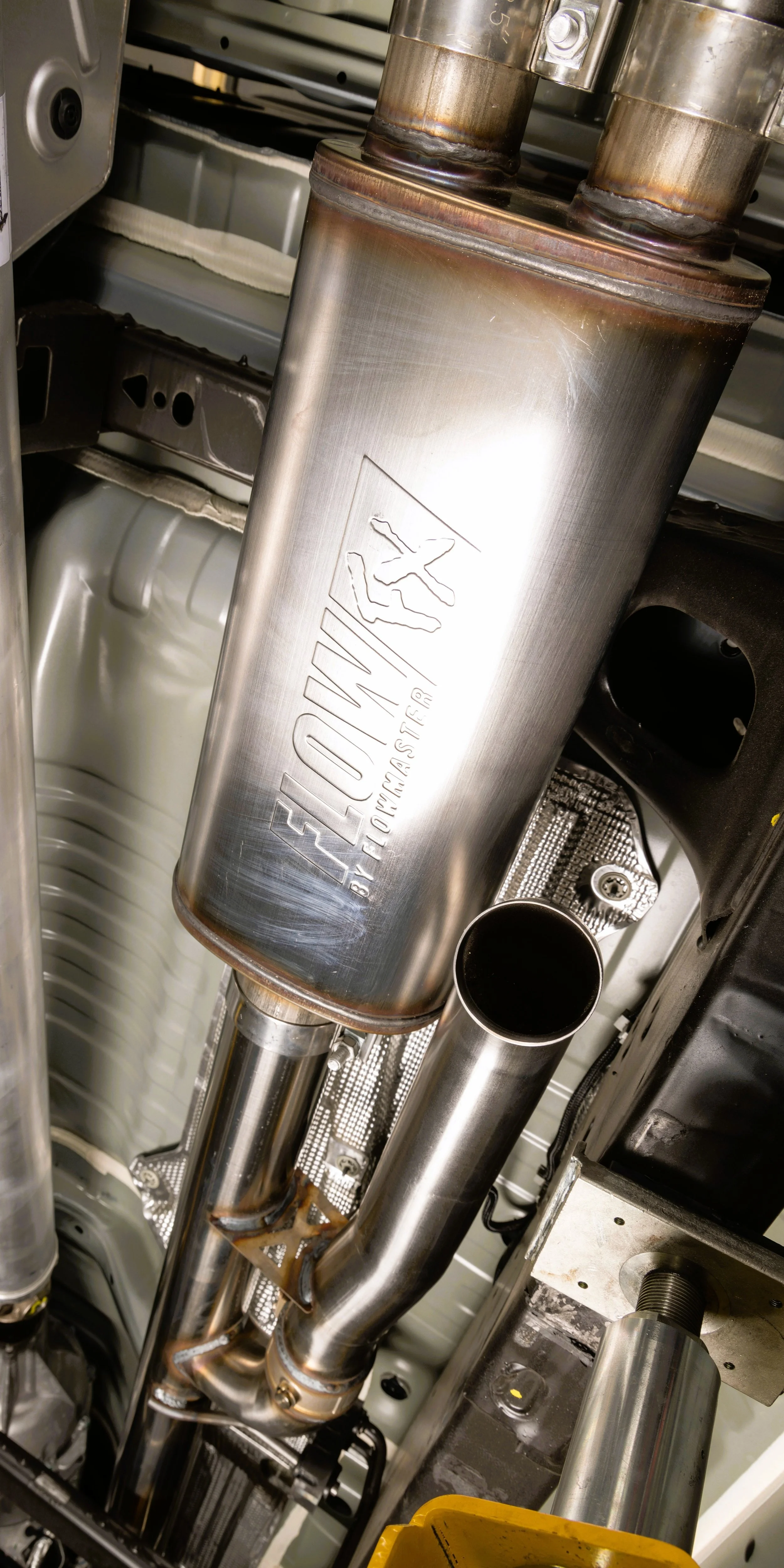 Flowmaster performance muffler and exhaust system installed under vehicle — exhaust installation in Bridgeville, PA (South Hills Pittsburgh)