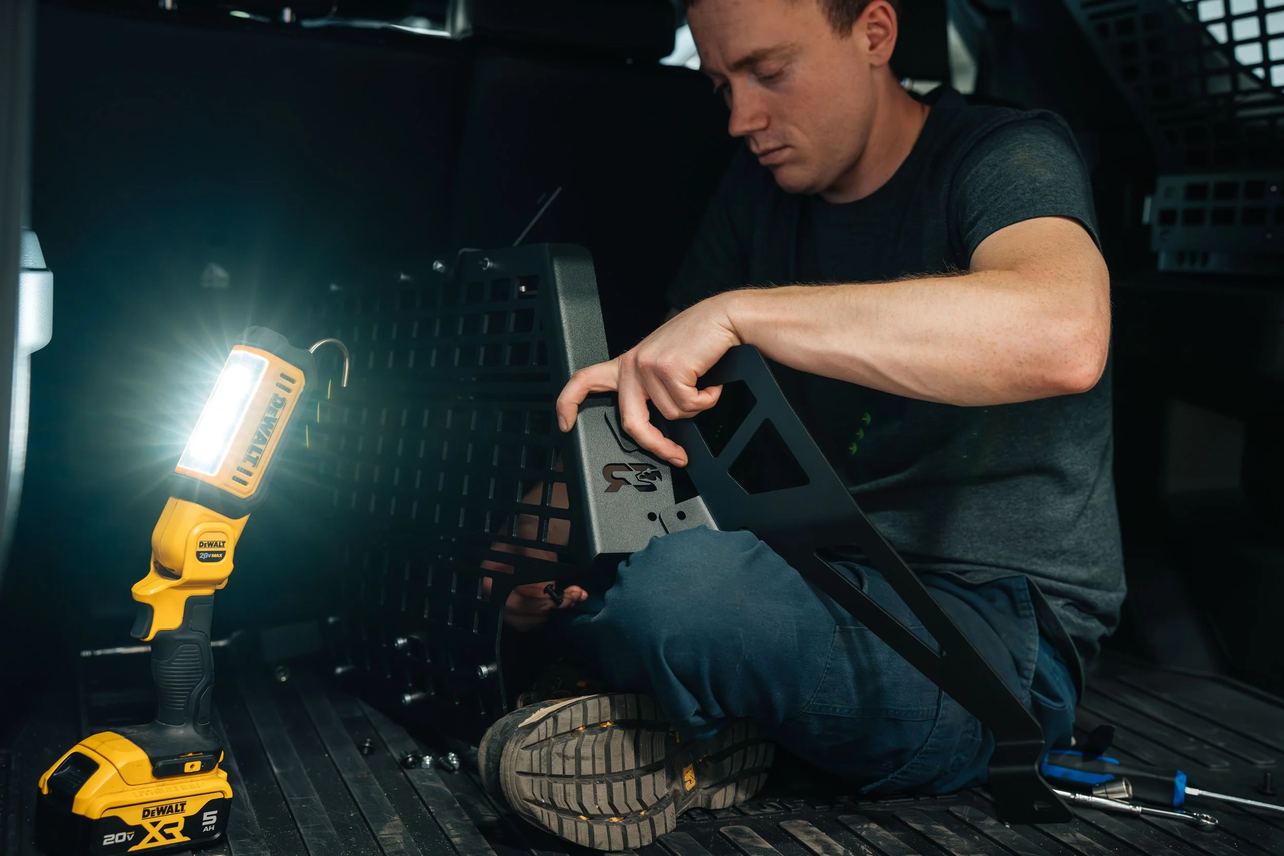 Xtreme Car and Truck Accessories technician installing customer-supplied Cali Raised LED MOLLE panels in a 2025 Toyota 4Runner. Professional bring-your-own-parts installation in Bridgeville, PA near Pittsburgh