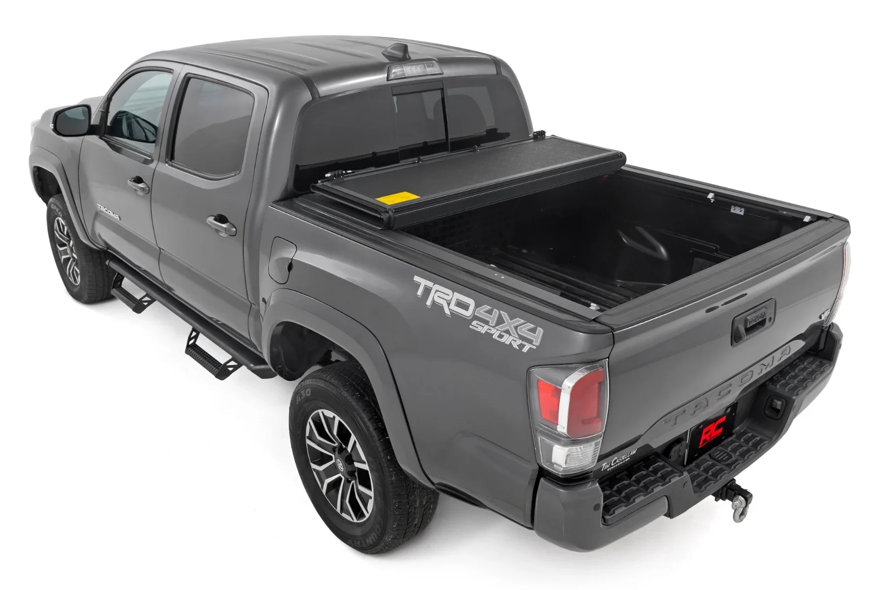 Hard folding tonneau truck bed cover on a Toyota Tacoma, sold and installed by Xtreme Car & Truck Accessories in Bridgeville, PA