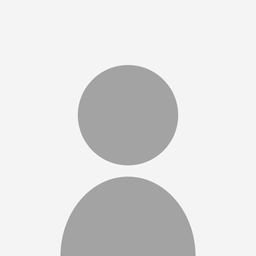 Generic user icon, gray silhouette on a white background.