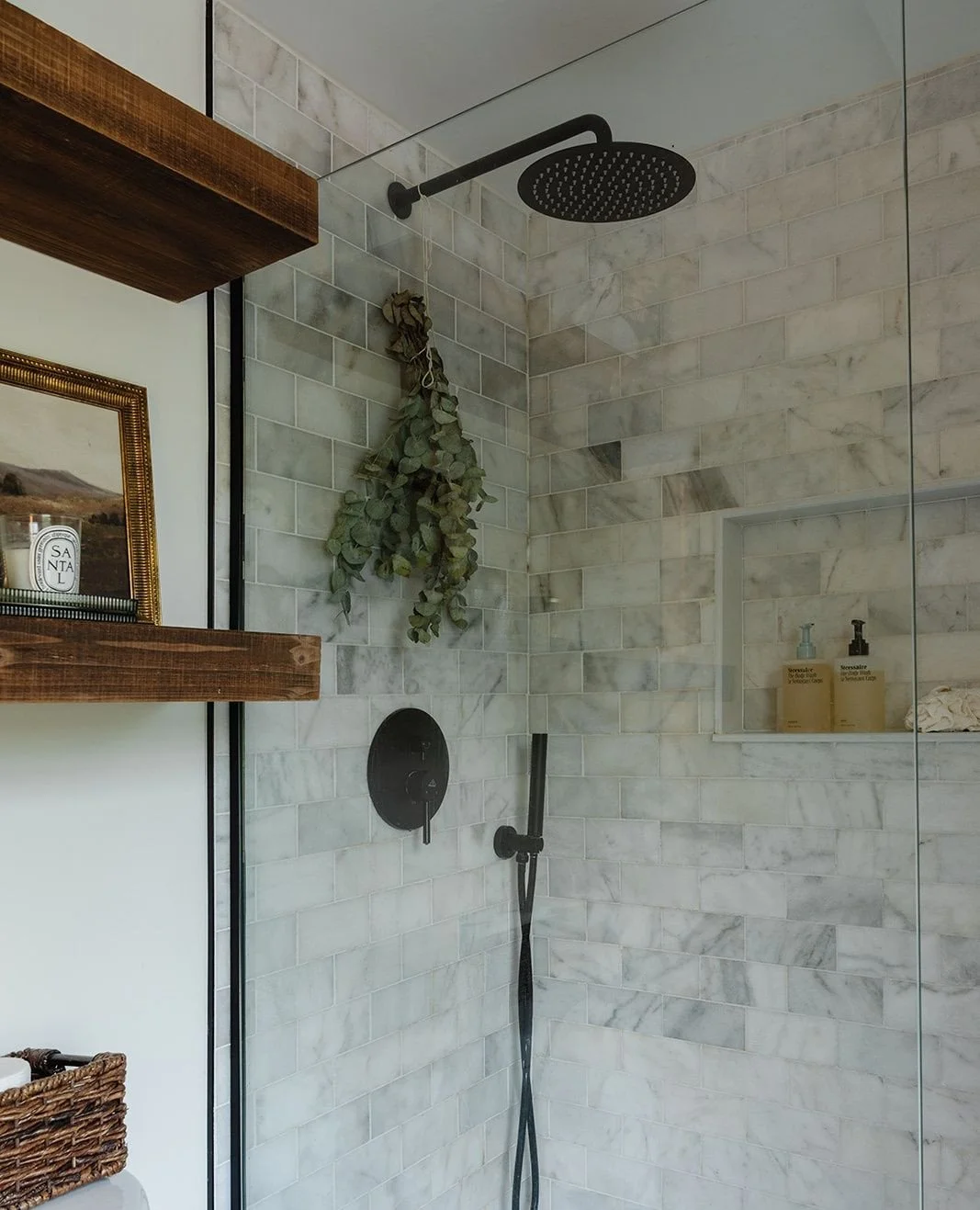 Bathroom Styling Tip: Mix natural elements with polished finishes for balance.