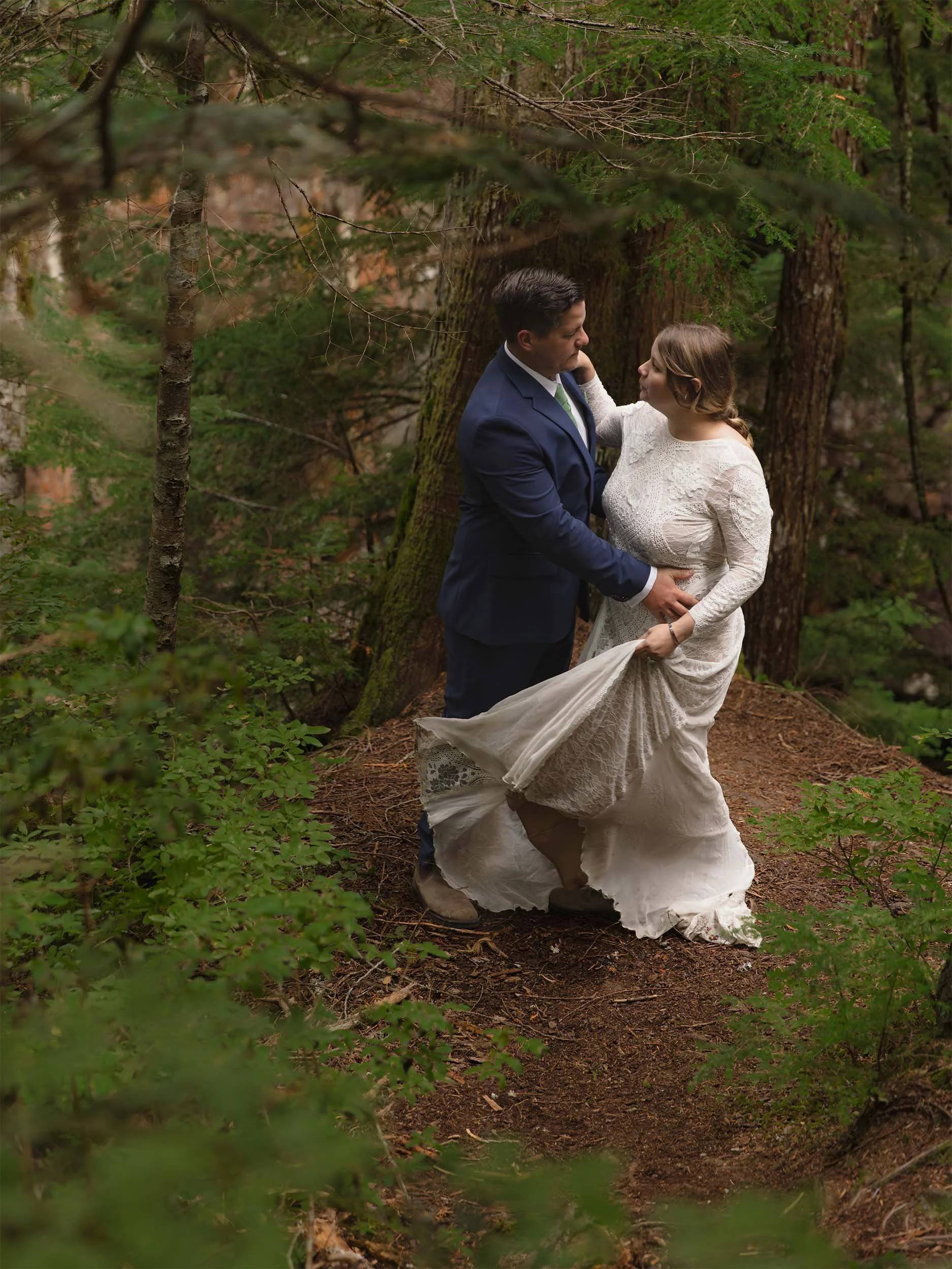 Bride and groom dance in a forest clearing during their Snoqualmie elopement.