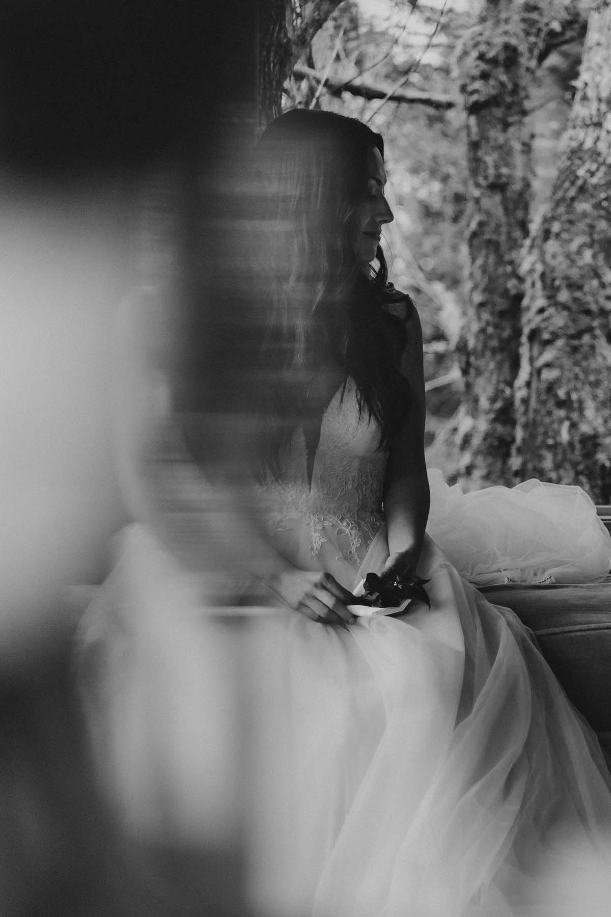 Artistic black and white with interesting reflection effect in a vase in the foreground.