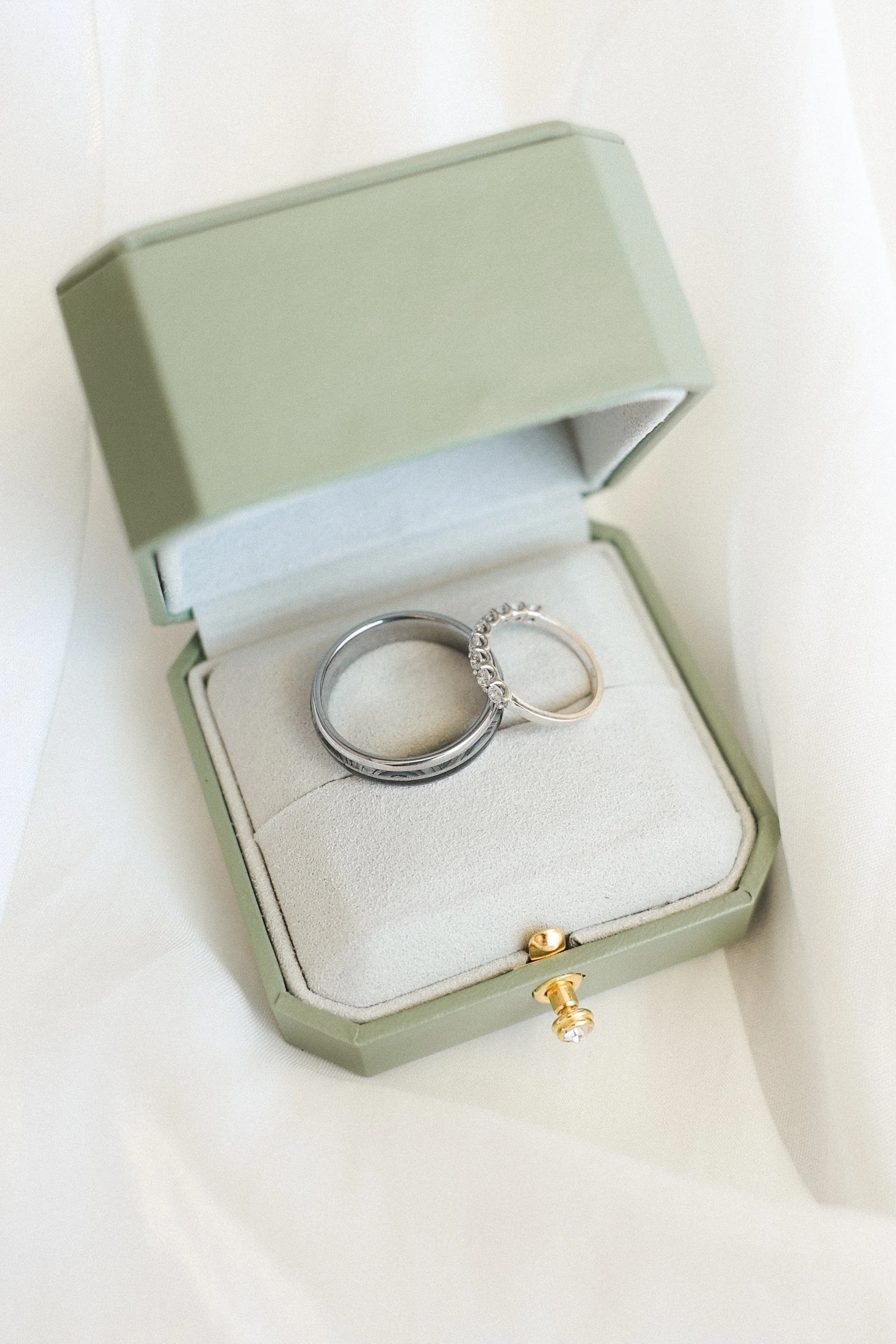 Wedding rings in a green box, luxury wedding detail shot, St. Regis Longboat Key, Tampa Bay wedding photographer Divine Design Photography