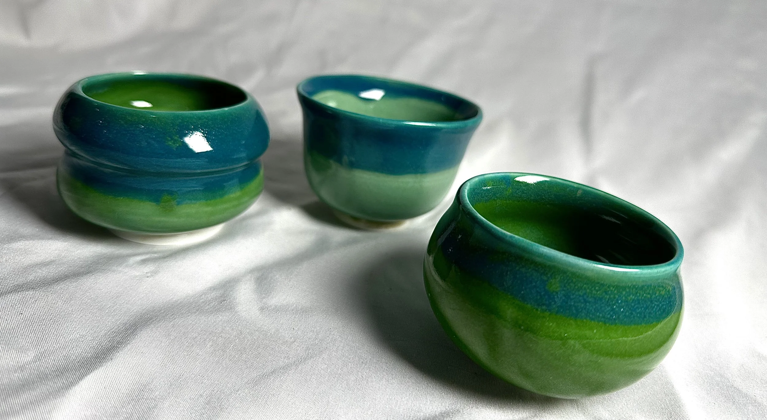 "Gradience I, II, & III", 2025, Porcelain, 4.4 x 3.3 x 3.9 in., 4.5 x 3.3 x 4 in., 4.2 x 3 x 3.9 in.