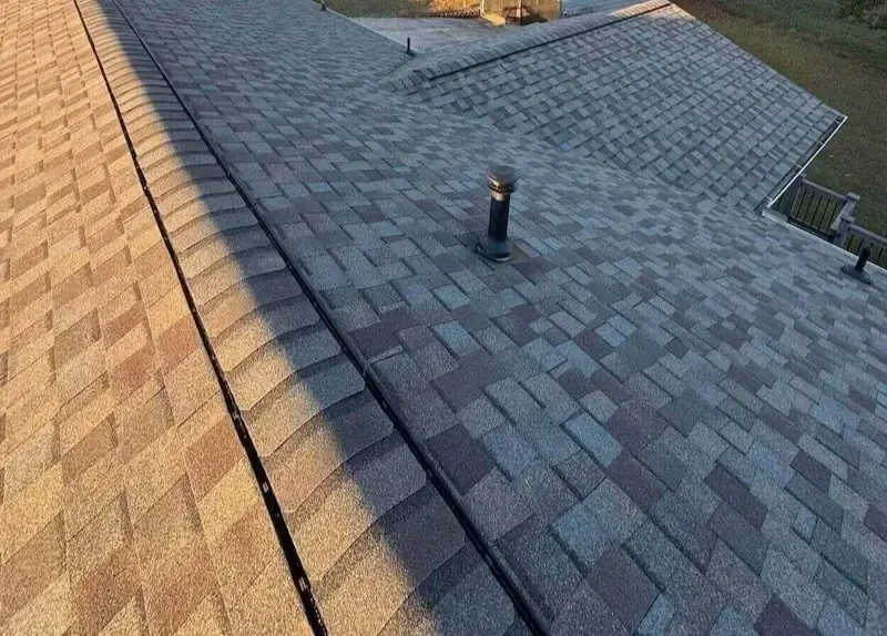 Gray asphalt shingles and chimney pipe on Northeast Georgia home