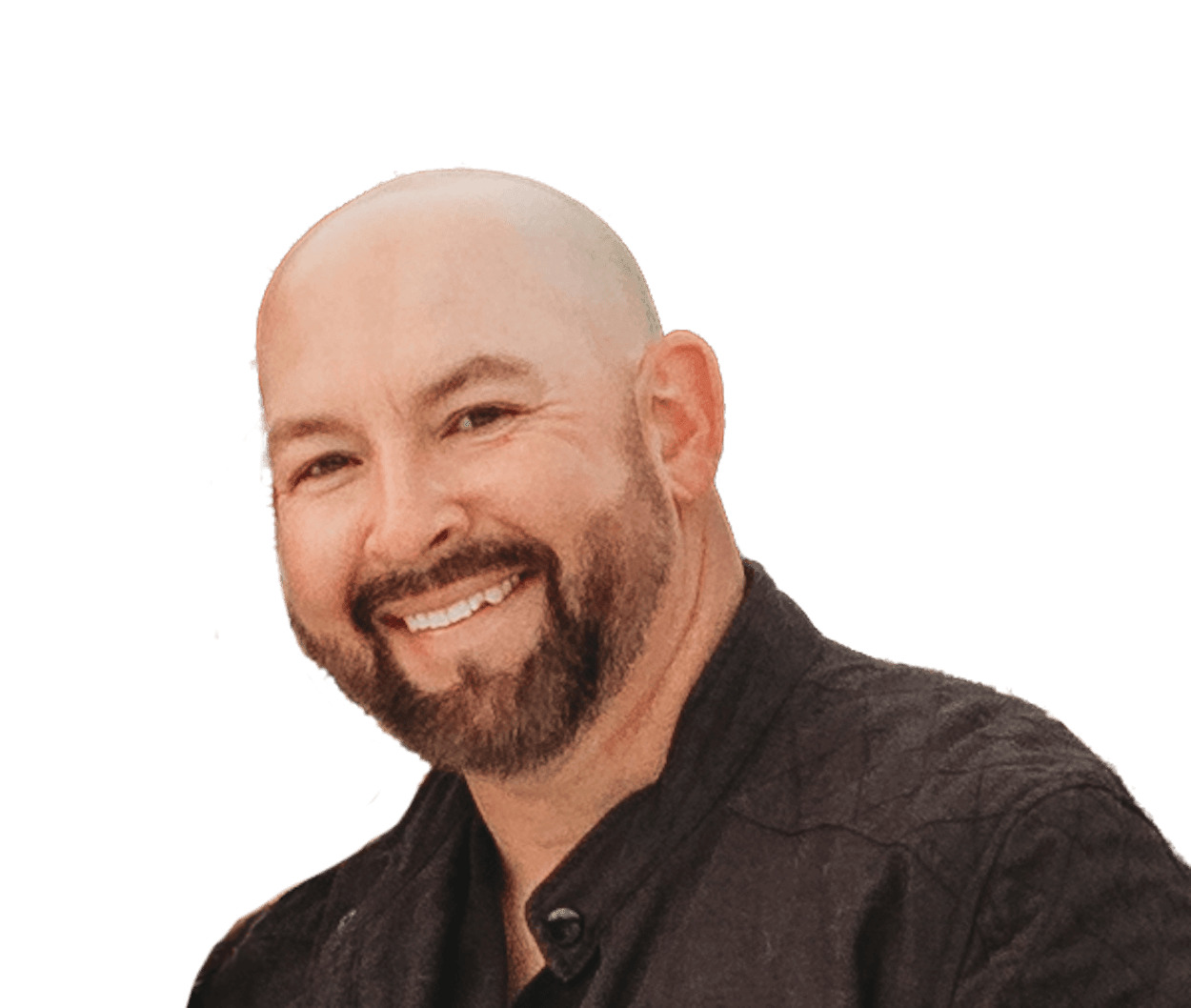 Smiling bald man with a beard and mustache wearing a dark shirt