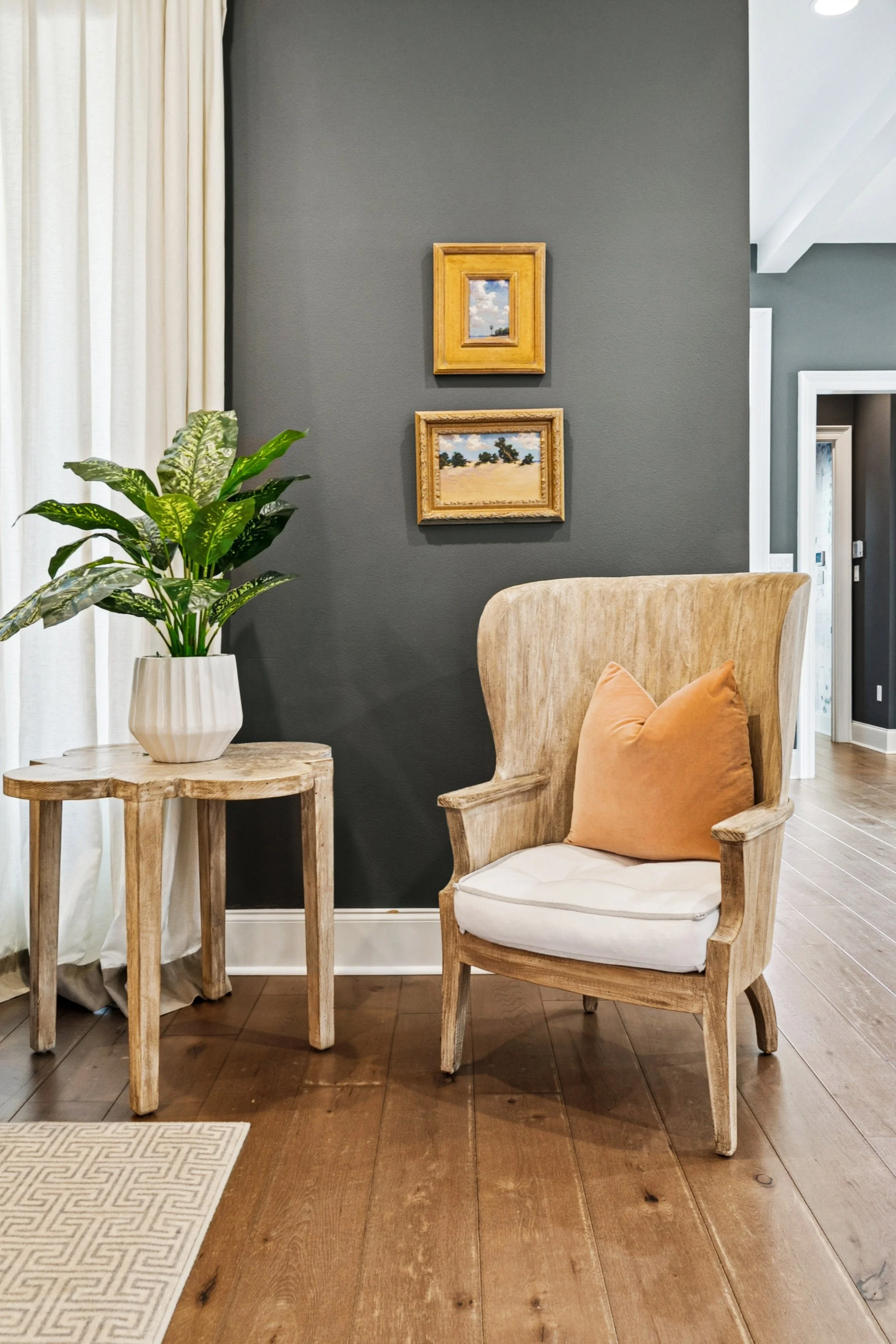 A cozy living space accessorized with luxury home staging services by Aimee (Amay) Curole, Broker/Owner, 23 Realty, Top Realtor in Metairie, LA.