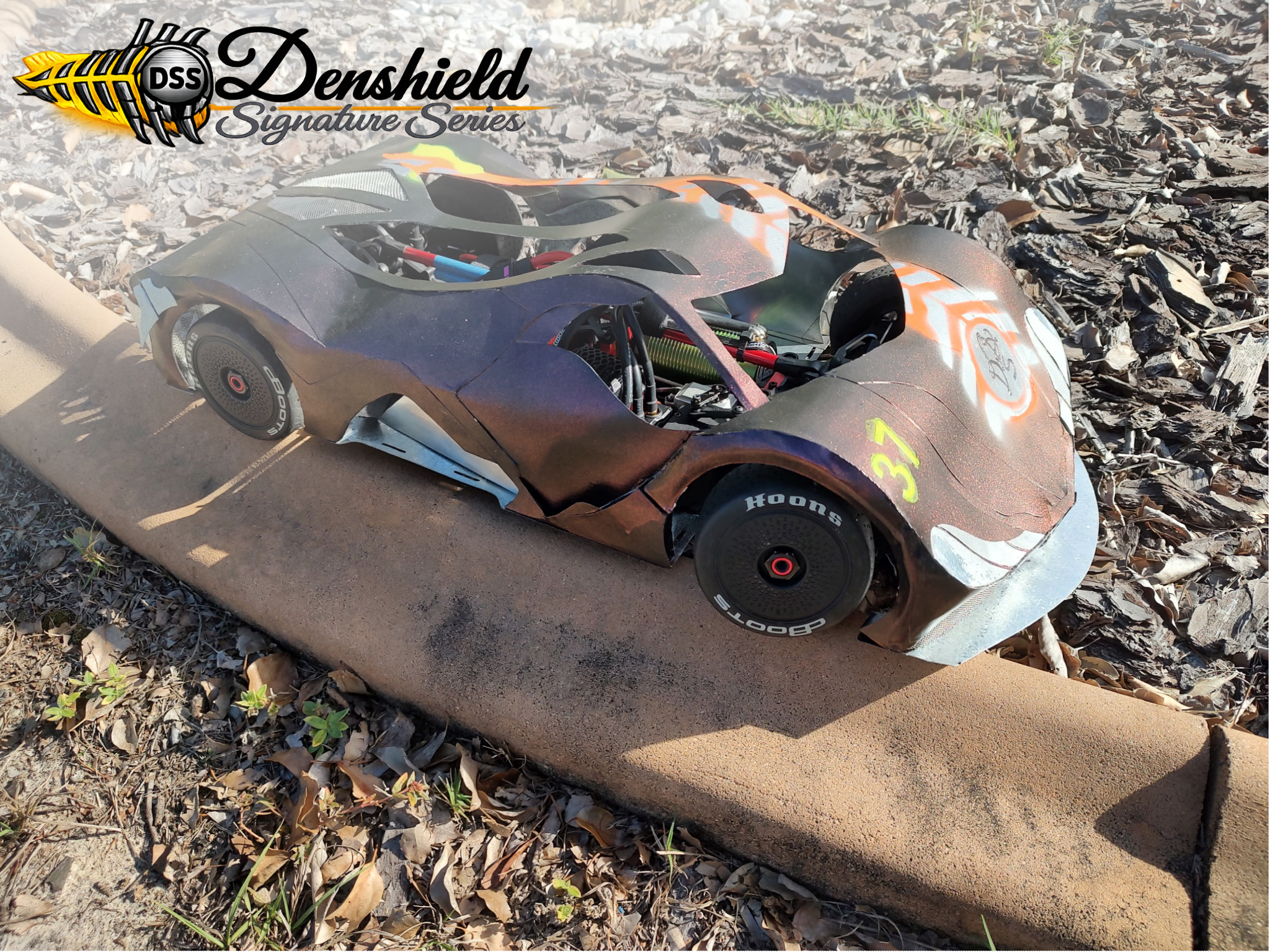 denshield signature series rc vehicle sitting on a ledge