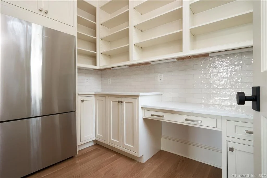 Custom pantry and desk cabinetry in an Essex CT coastal home