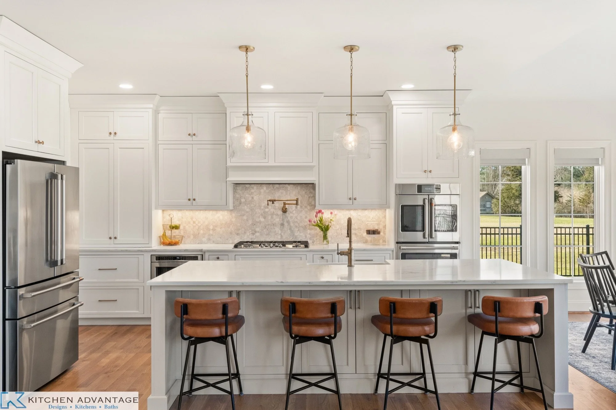 East Haddam kitchen with white inset cabinets and a soft-blue island seating four