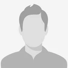 A grayscale, faceless silhouette of a man with short hair, wearing a collared shirt.