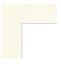 Blank white corner of a paper or surface.