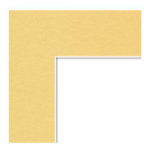 A corner of a yellow paper sheet overlapping a white sheet of paper.