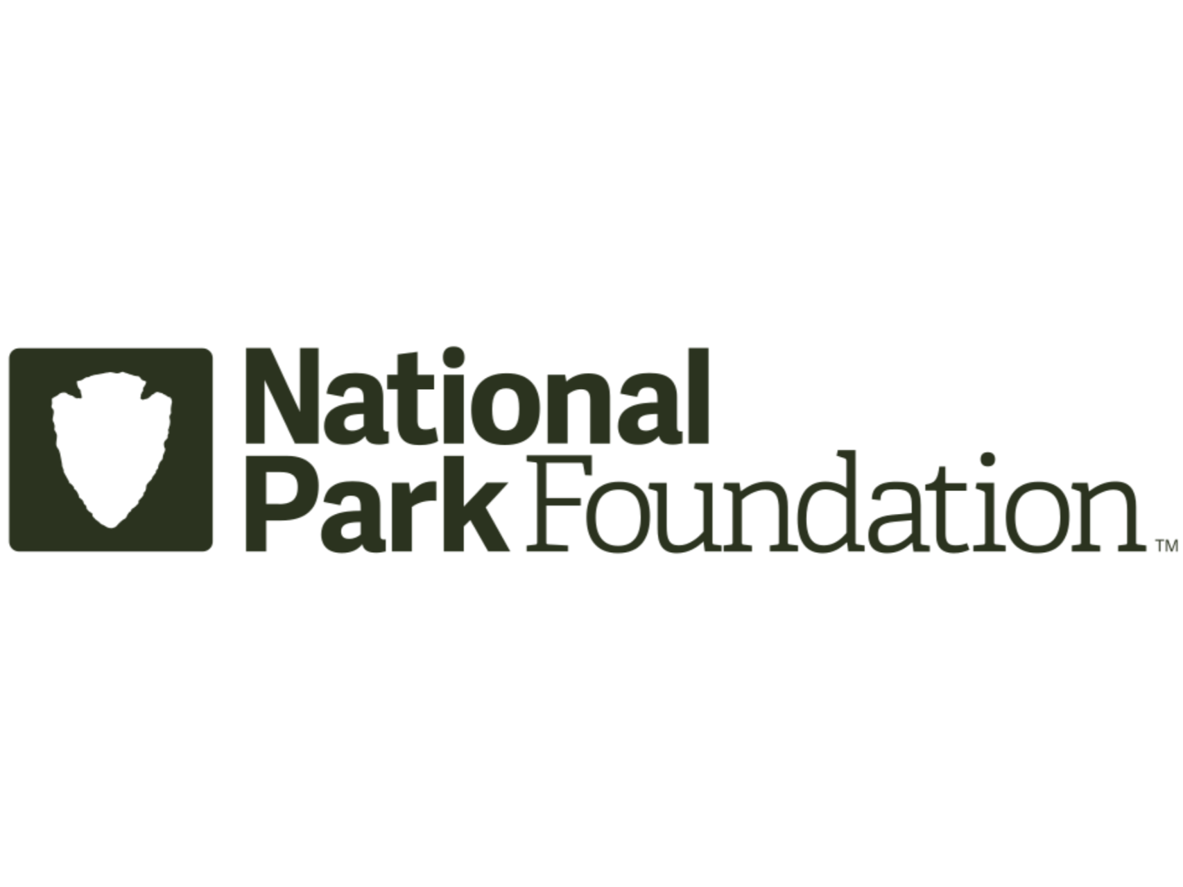 Logo of the National Park Foundation featuring a green shield with a mountain and trees, with the organization name beside it.