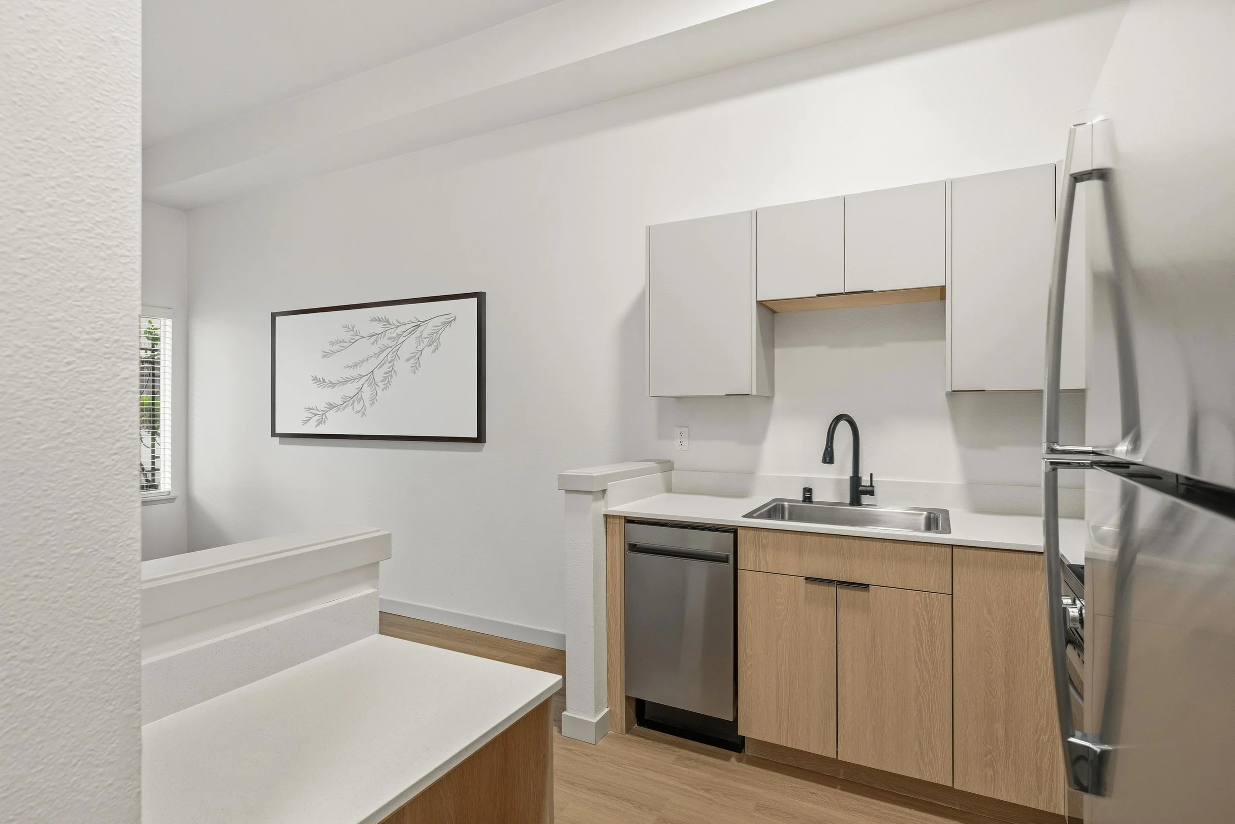 Kitchen and partial living room - edited.jpg