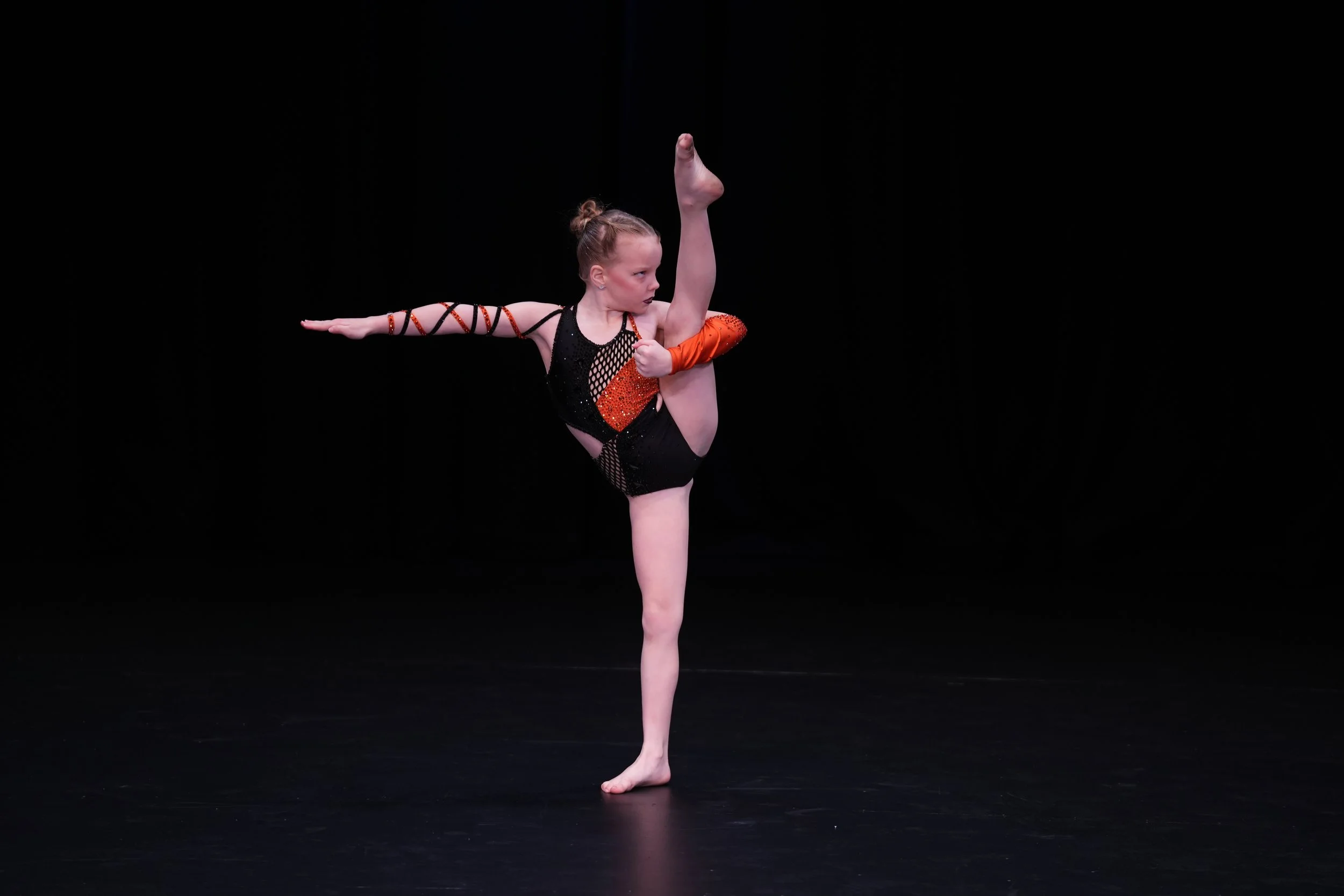 starbound-2025-solo-dance-performance-girl-contemporary-orange-costume.JPG